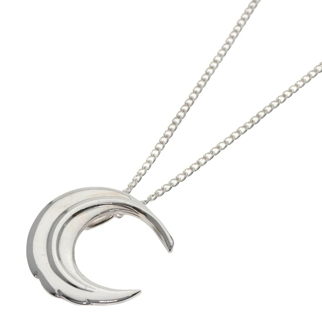 Tiffany & Co. Crescent Moon Necklace in Silver: Tiffany & Co. Crescent Moon Necklace in Silver Elegance meets understated sophistication in the Tiffany & Co. Crescent Moon Necklace, a timeless piece of silver jewelry that shines with subtle eleganc