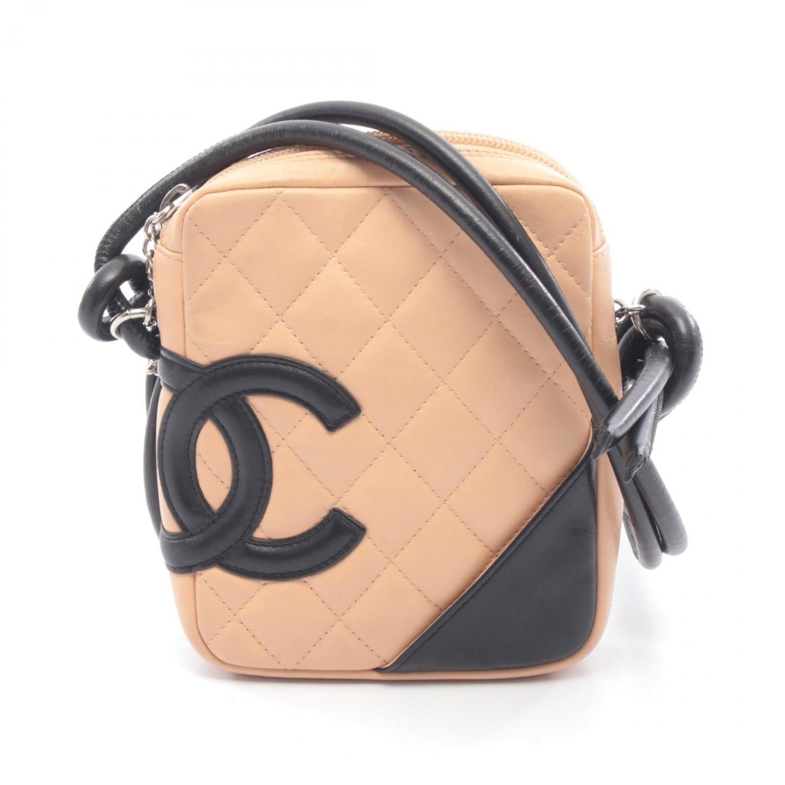 Chanel Shoulder Bag in Cambon Ligne: Chanel Shoulder Bag in Cambon Ligne A timeless Chanel shoulder bag in the iconic Cambon Ligne material, this beige and black piece exudes classic elegance with its clean lines and understated sophisti
