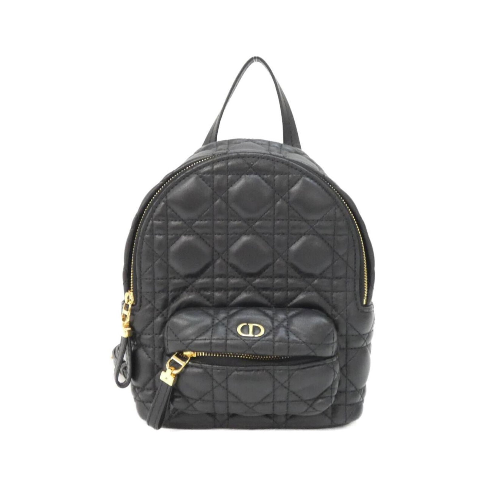 Christian Dior Leather Backpack: Christian Dior Leather Backpack Elevate your everyday style with the timeless Christian Dior leather backpack, crafted from rich lamb leather and adorned with elegant gold hardware. This classic desig