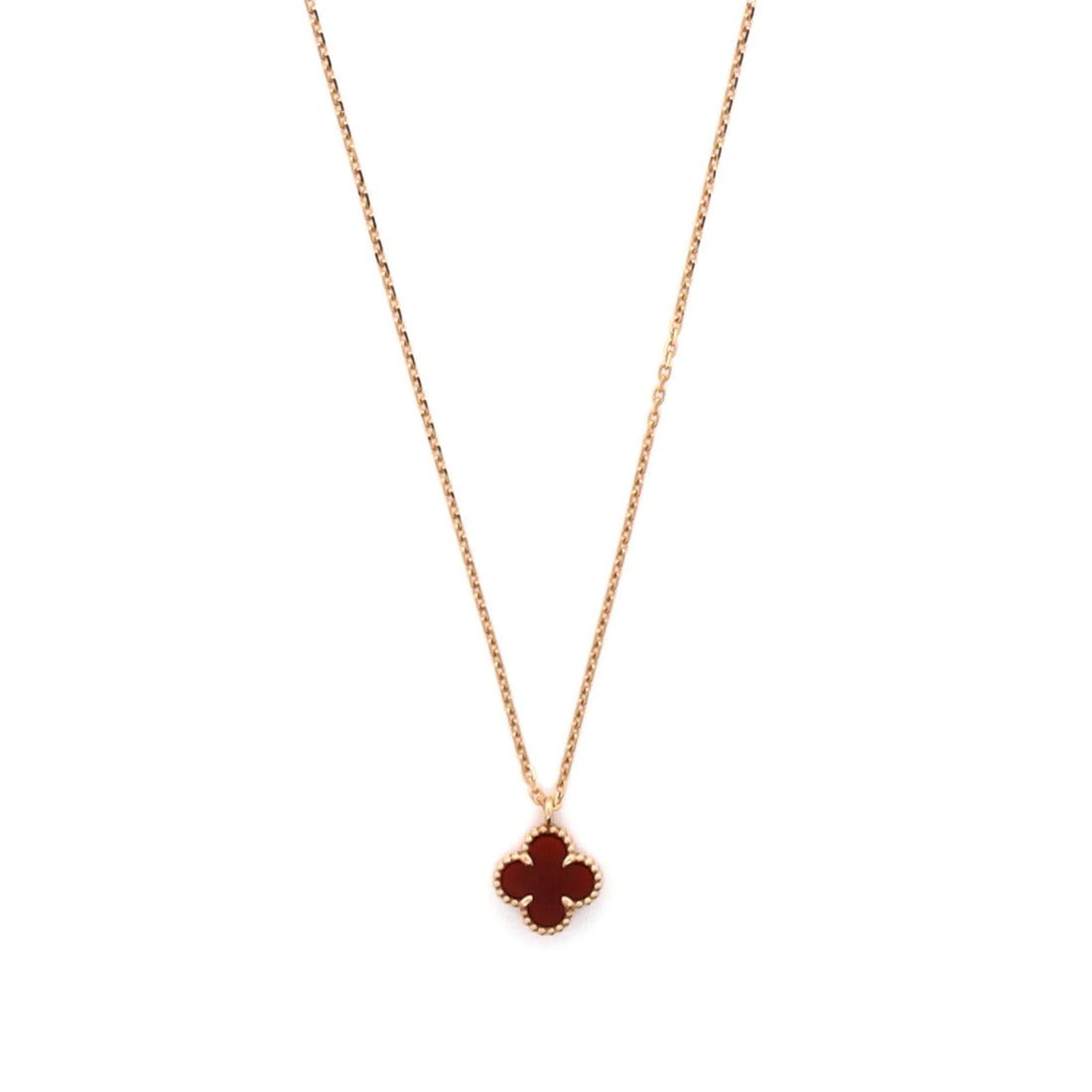 Van Cleef & Arpels Sweet Alhambra Pendant Necklace in 18K Rose Gold with Carnelian: Van Cleef & Arpels Sweet Alhambra Pendant Necklace in 18K Rose Gold with Carnelian Experience the timeless elegance of Van Cleef & Arpels' Sweet Alhambra Pendant Necklace, set in stunning 18K rose gol