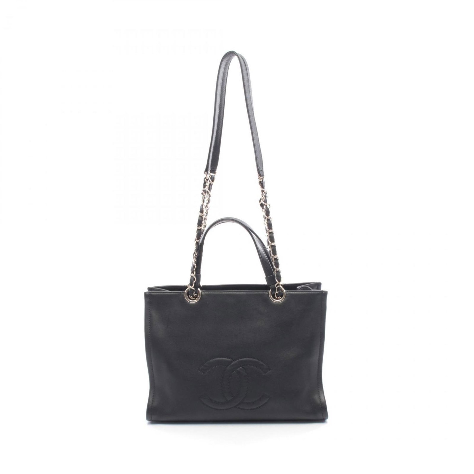 Tote Bag Leather - Chanel Handbag: Tote Bag Leather - Chanel Handbag A luxurious black lambskin tote bag in the iconic Chanel style, boasting sleek gold hardware and premium leather construction. With its classic design and timeless el