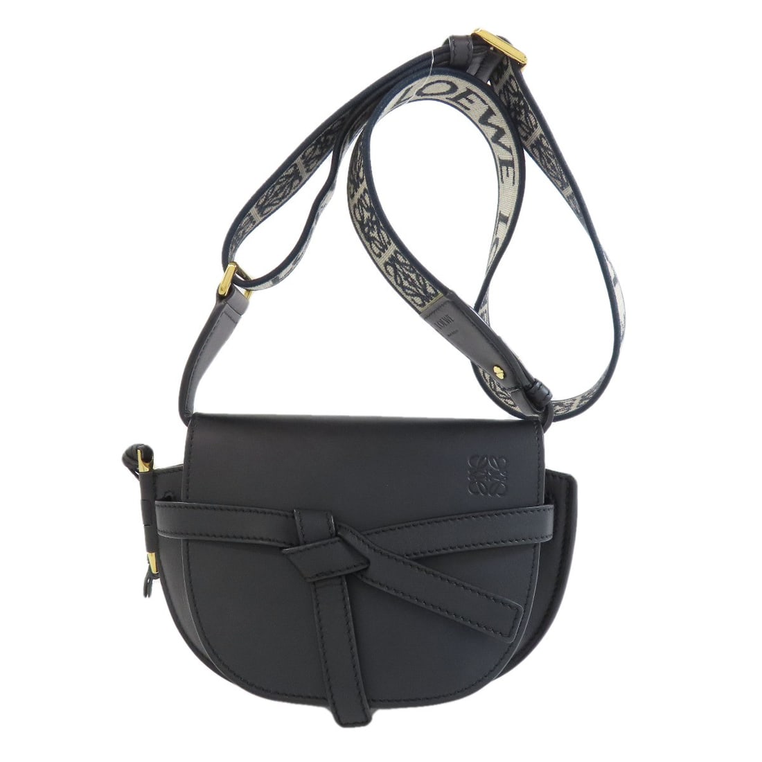 Loewe Gatedual Mini Shoulder Bag in Calf: Loewe Gatedual Mini Shoulder Bag in Calf Elevate your everyday style with the sleek Loewe Gatedual Mini Shoulder Bag, crafted from rich calf leather in a timeless black hue. This chic shoulder bag boa