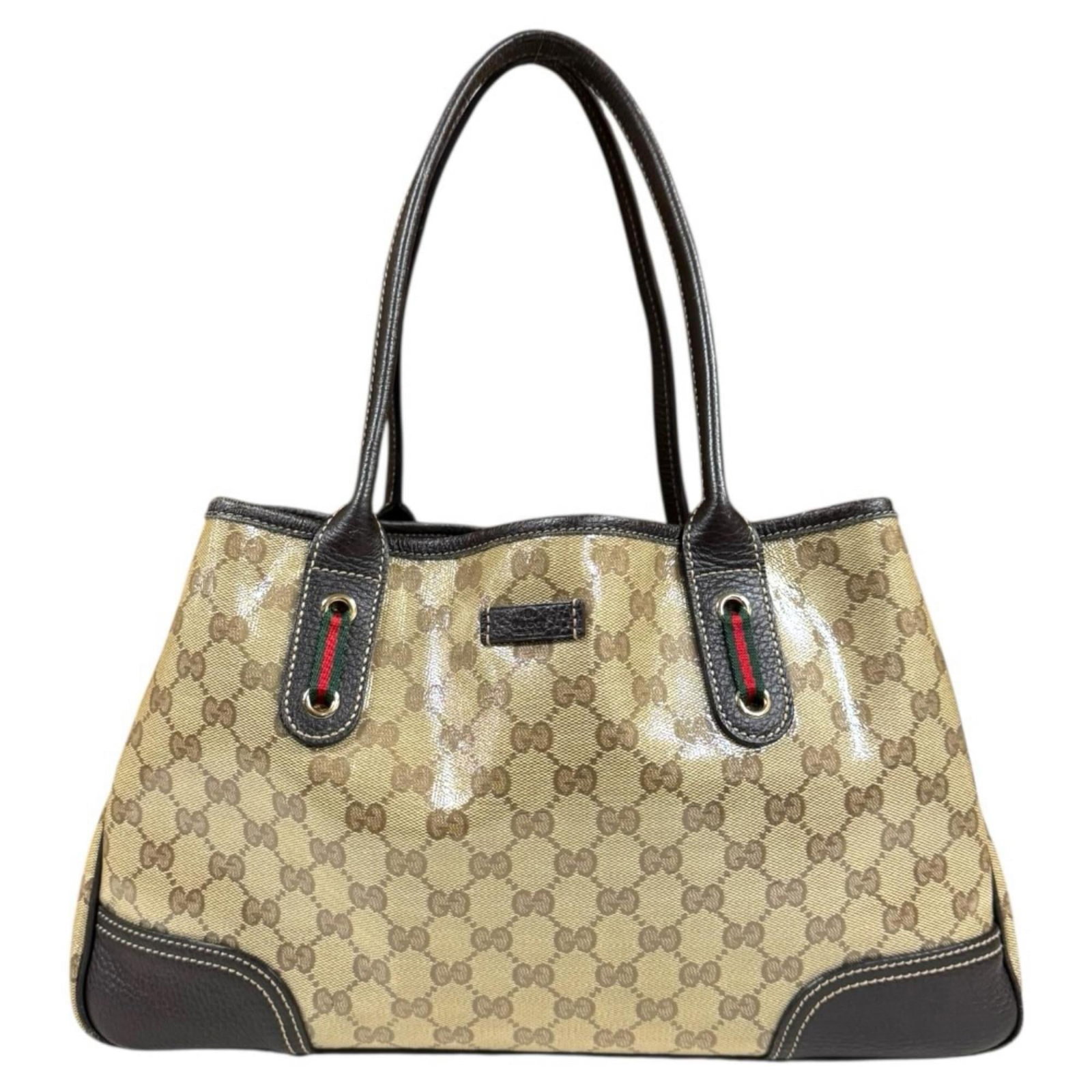 Gg Crystal - Gucci Tote Bag Leather: Gg Crystal - Gucci Tote Bag Leather A pre-owned Gucci tote bag in exquisite beige leather, adorned with the iconic Gg Crystal logo, adds a touch of luxury to any outfit. With its classic design and
