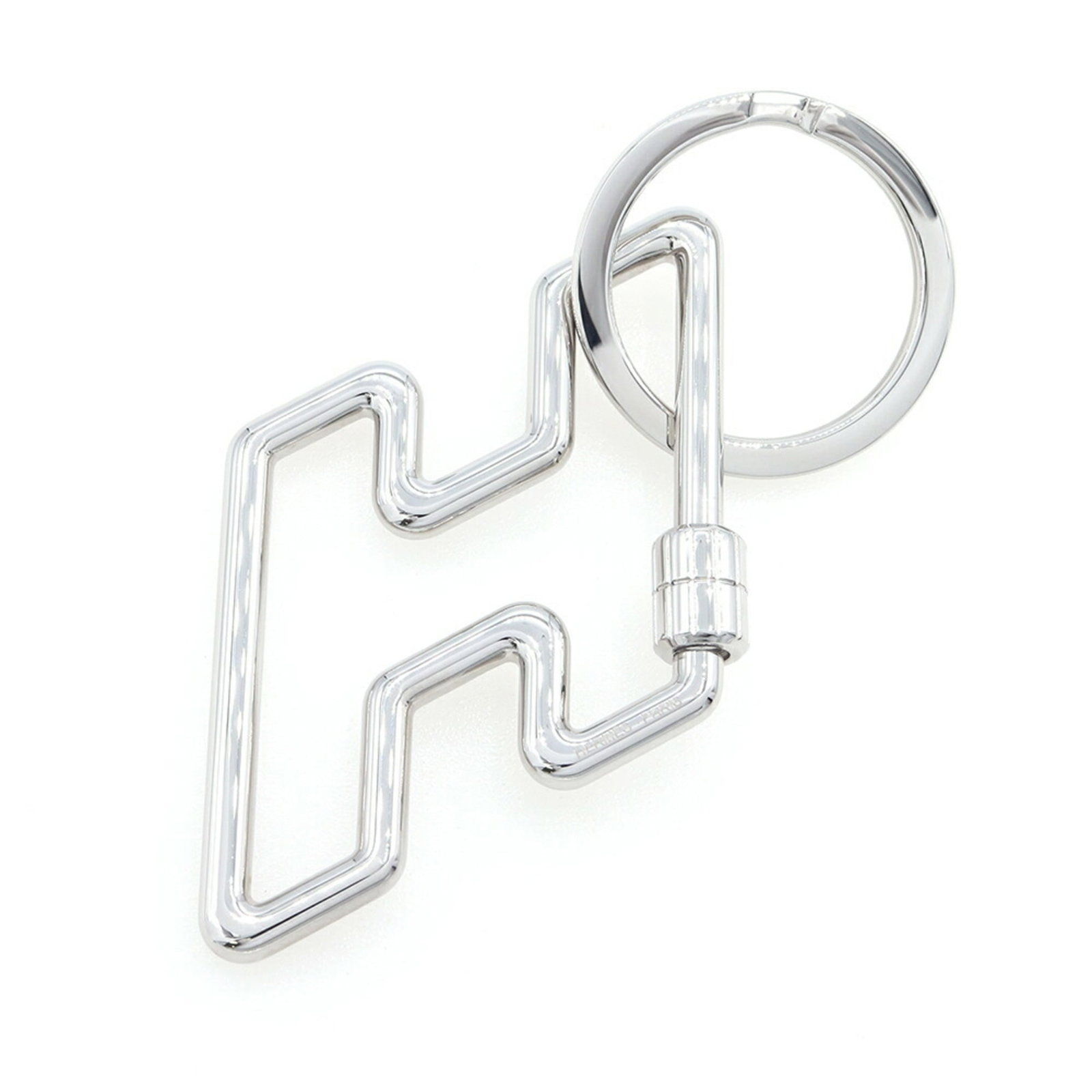 Hermes Metal Keyring: Hermes Metal Keyring A sleek and sophisticated accessory for the modern key, this Hermes metal keyring boasts a durable silver finish and premium quality that exudes timeless elegance. With its compac