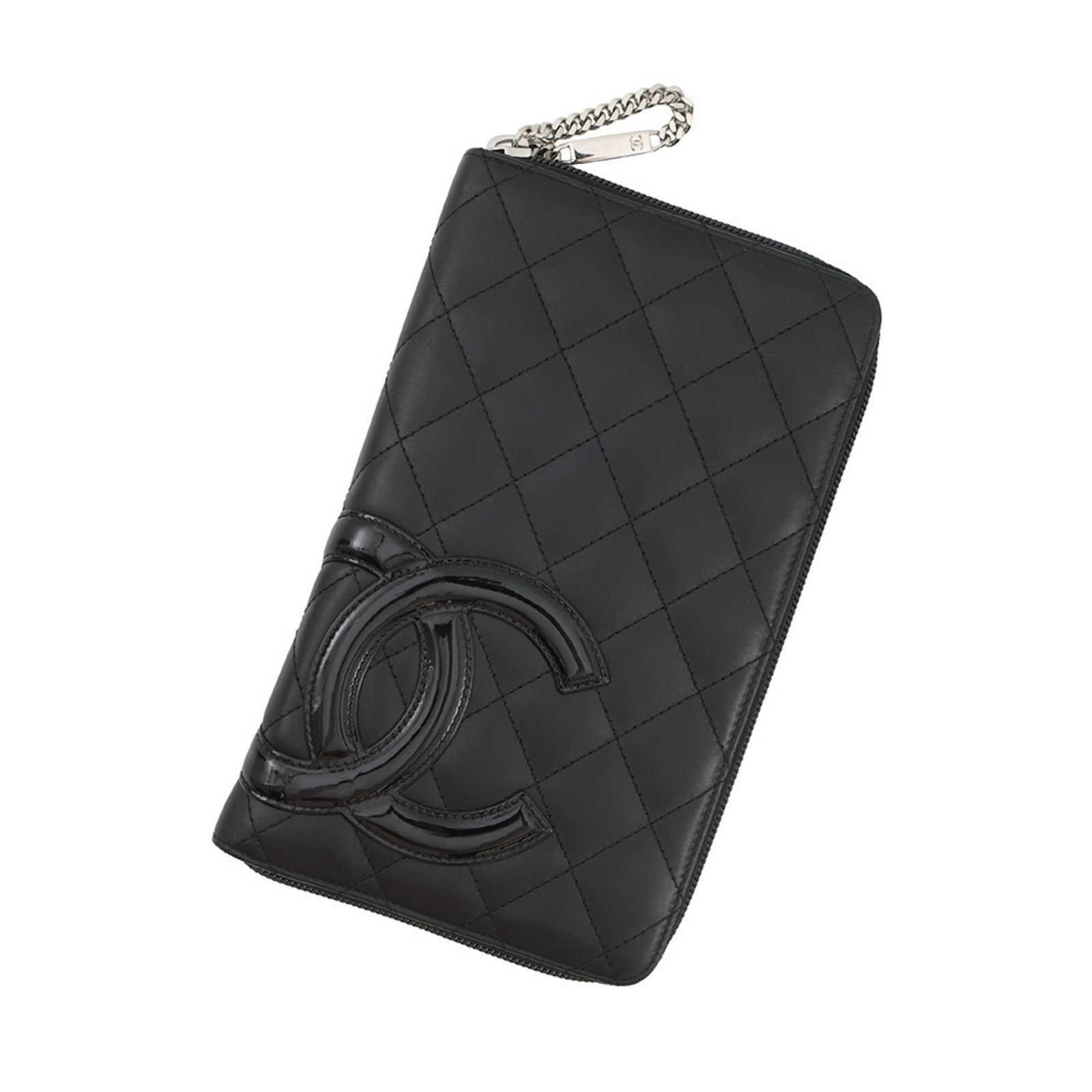 Chanel Bi-Fold Leather Wallet: Chanel Bi-Fold Leather Wallet A timeless Chanel bi-fold leather wallet, crafted from luxurious lambskin in sleek black, adds an air of sophistication to any daily routine. Its classic design and premi