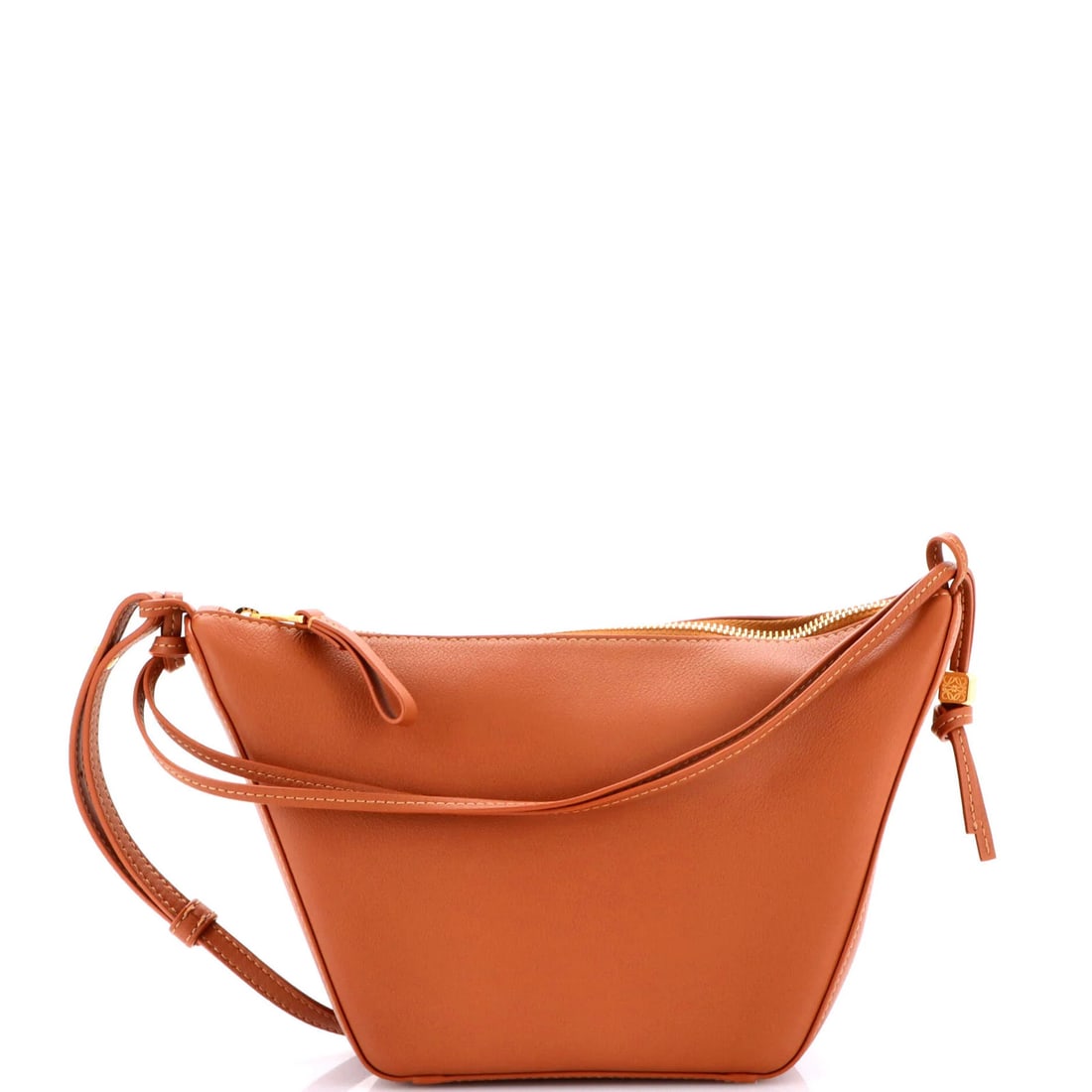 Loewe Mini Leather Hobo Hammock: Loewe Mini Leather Hobo Hammock The Loewe Mini Leather Hobo Hammock is a stylish and compact cross-body bag perfect for everyday use, with its rich brown leather exterior and neutral interior providin