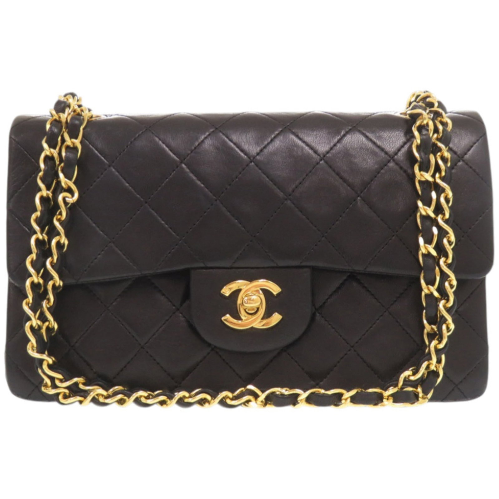 Chanel Shoulder Bag in Leather: Chanel Shoulder Bag in Leather A timeless Chanel shoulder bag in luxurious lambskin leather, perfect for adding an air of sophistication to any outfit. With its classic design and sleek black finish,