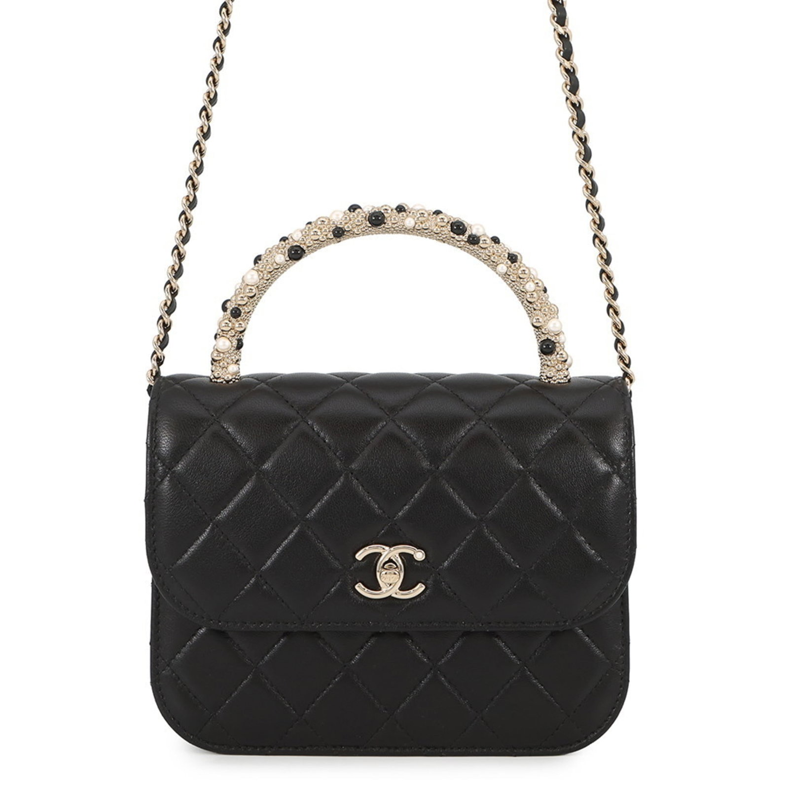 Chanel Shoulder Bag in Leather: Chanel Shoulder Bag in Leather A sleek and sophisticated Chanel shoulder bag, crafted from luxurious lambskin leather in rich black. With its classic design and timeless appeal, this bag is perfect fo