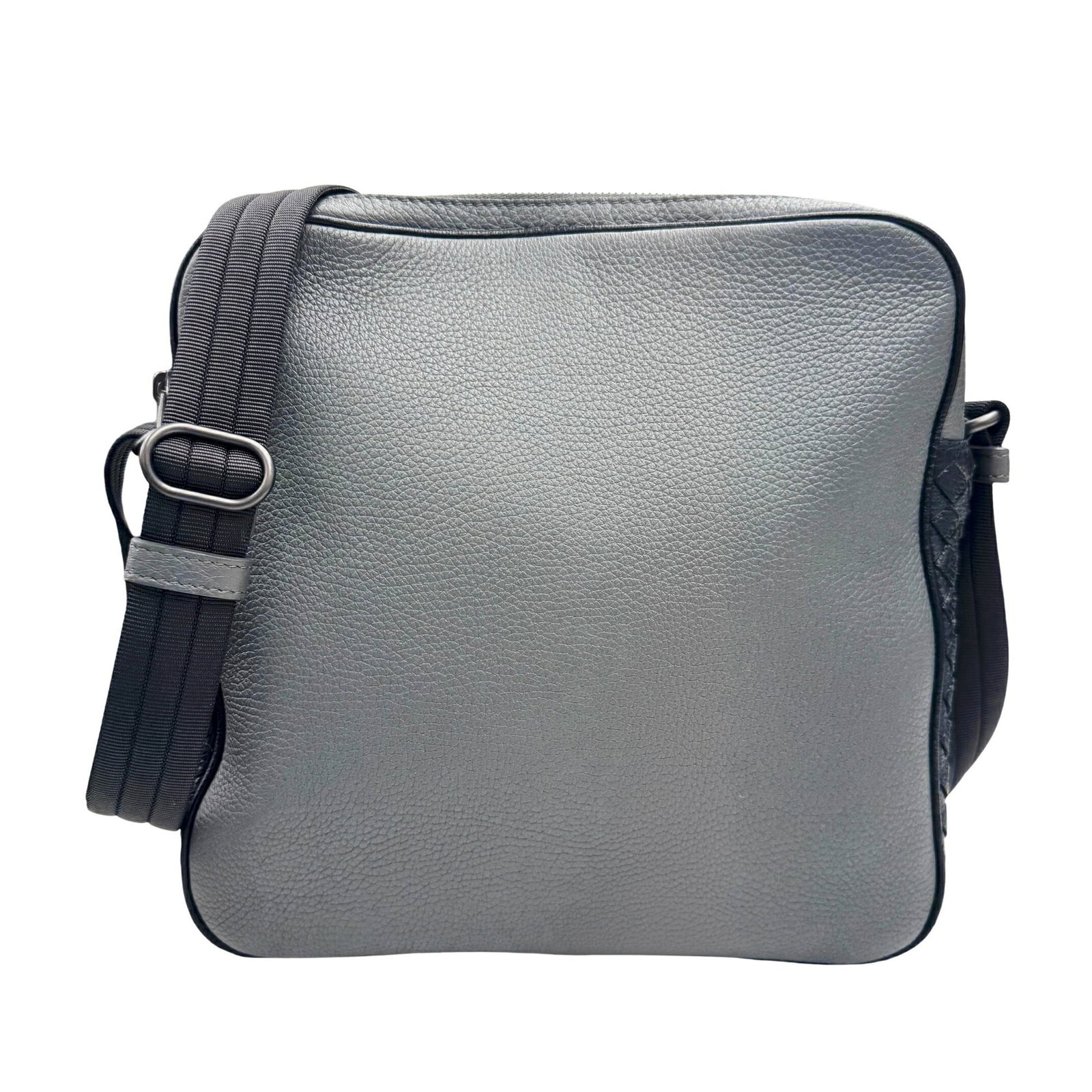 Bottega Veneta Leather Shoulder Bag: Bottega Veneta Leather Shoulder Bag A timeless Bottega Veneta leather shoulder bag in sleek black and gray, boasting the iconic intrecciato woven pattern that sets this piece apart from others. With i