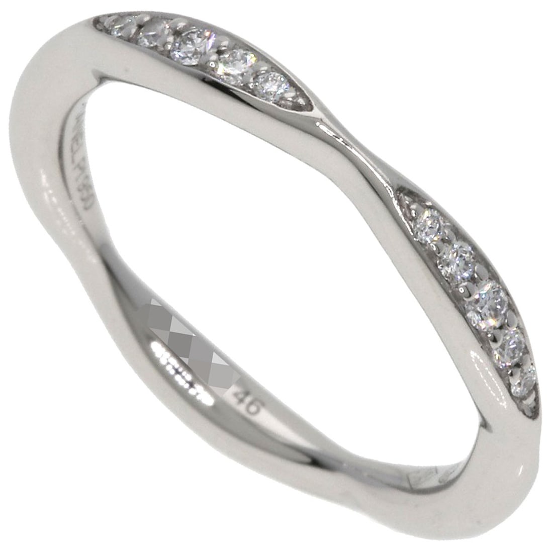 Chanel Camellia Half Diamond Ring #46 in Platinum: Chanel Camellia Half Diamond Ring #46 in Platinum Elegance meets sophistication in this stunning Chanel Camellia Half Diamond Ring, set in platinum and adorned with a 3.75 US size diamond. The sleek d