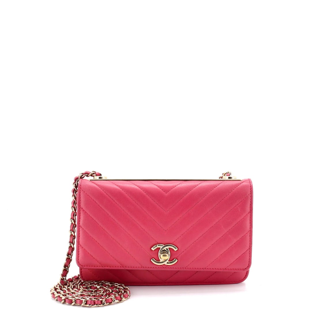 Chanel Lambskin Chevron CC Wallet on Chain: Chanel Lambskin Chevron CC Wallet on Chain Elevate your style with the iconic Chanel CC Wallet on Chain, crafted from luxurious lambskin and adorned with a chic chevron pattern in soft pink hues. The