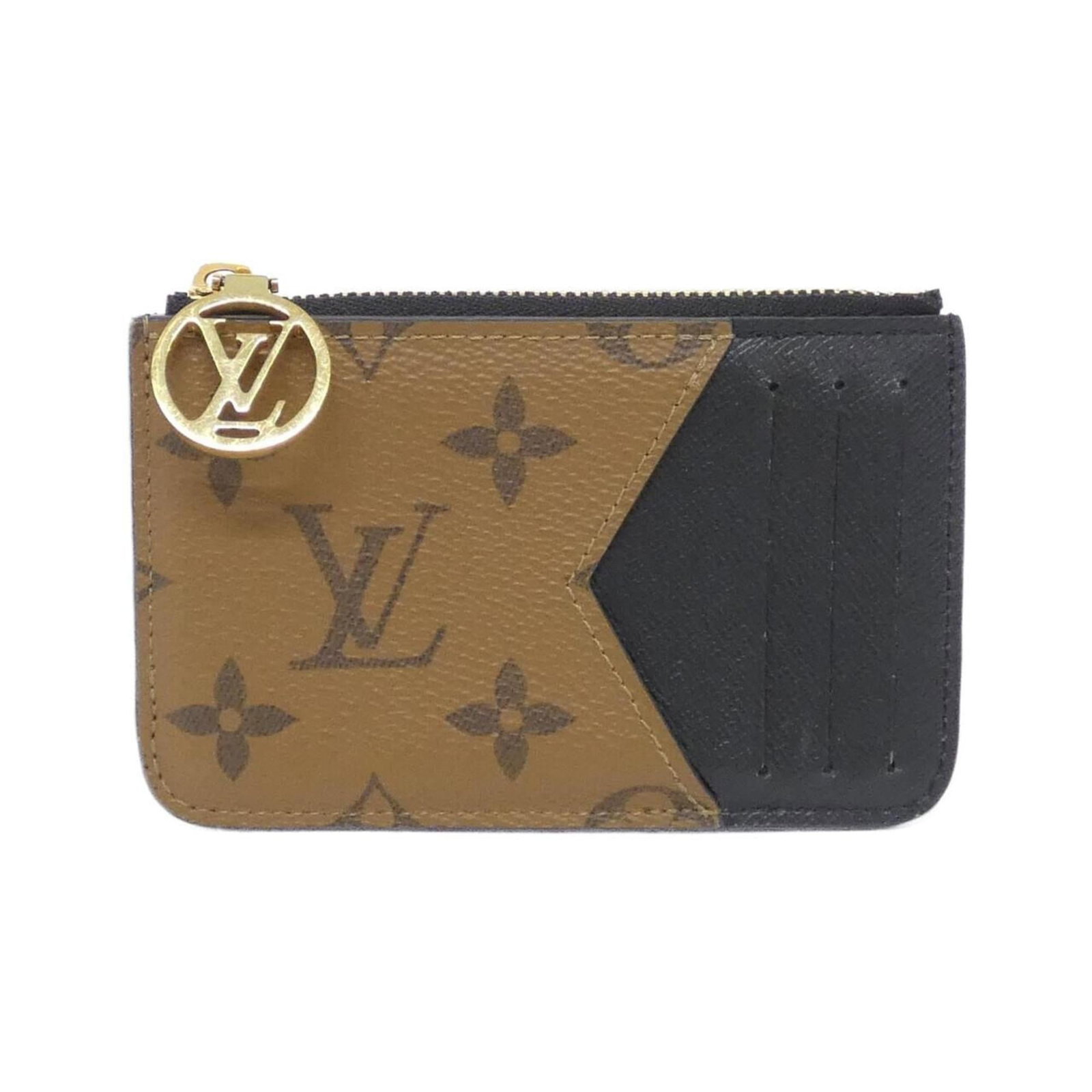 Louis Vuitton Business Card Case in Coated Canvas: Louis Vuitton Business Card Case in Coated Canvas A stylish touch for any professional, this Louis Vuitton business card case is crafted from durable coated canvas and boasts the iconic brand's signat