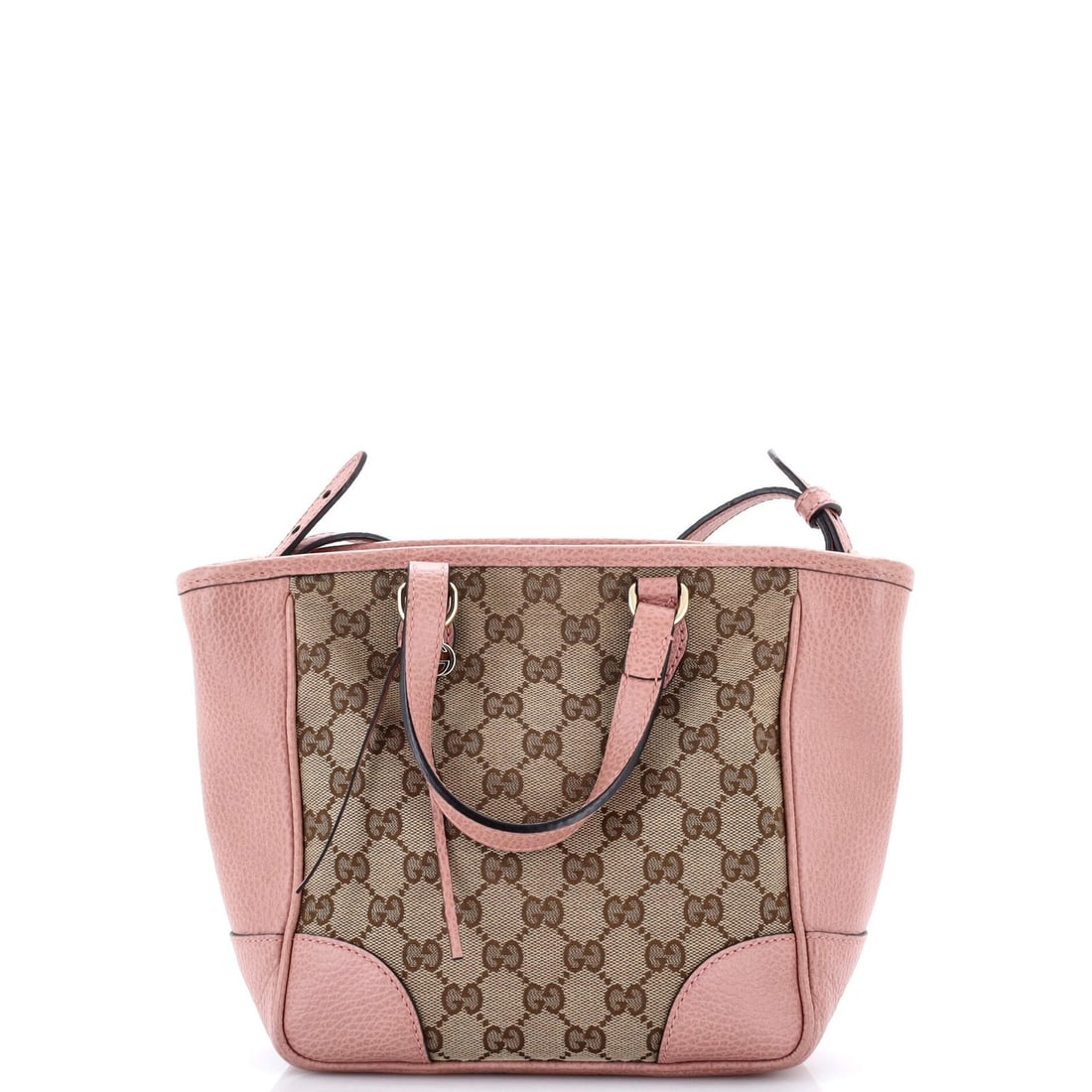 Gucci Small GG Canvas Tote in Leather Convertible: Gucci Small GG Canvas Tote in Leather Convertible Elevate your everyday style with the iconic Gucci Small GG Canvas Tote in Leather Convertible, boasting a chic cross-body design and convertible funct