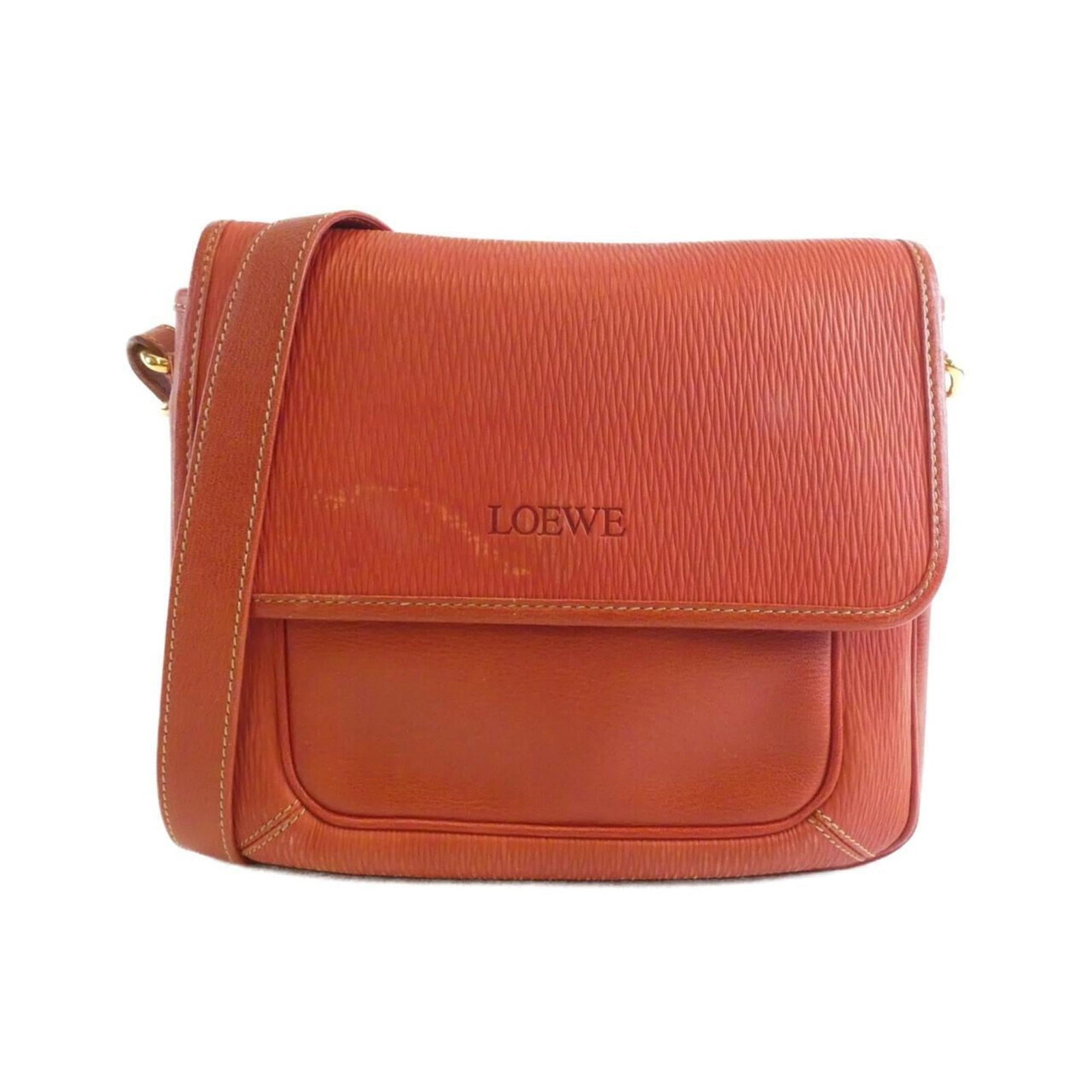 Loewe Leather Shoulder Bag: Loewe Leather Shoulder Bag A stunning red Loewe leather shoulder bag, its bold color and sleek design making it a statement piece for any woman on-the-go. With its classic gold hardware and durable le