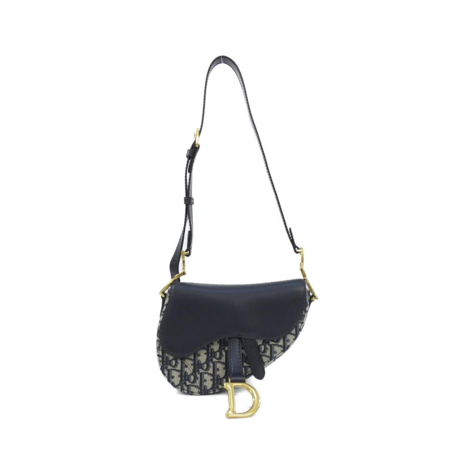 Christian Dior Canvas Shoulder Bag: Christian Dior Canvas Shoulder Bag A stunning Christian Dior canvas shoulder bag in a beautiful blue hue, adorned with elegant gold hardware, adds a touch of sophistication to any outfit. With its cla