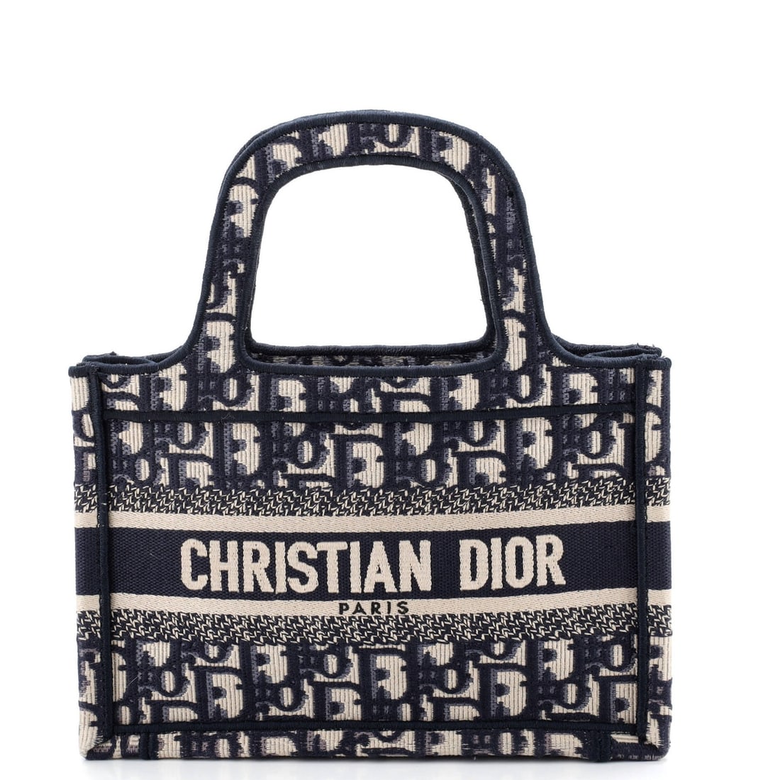 Christian Dior Mini Oblique Canvas Book Tote: Christian Dior Mini Oblique Canvas Book Tote Elevate your daily routine with the iconic Christian Dior Mini Oblique Canvas Book Tote, boasting a chic blue canvas exterior and spacious interior perfect