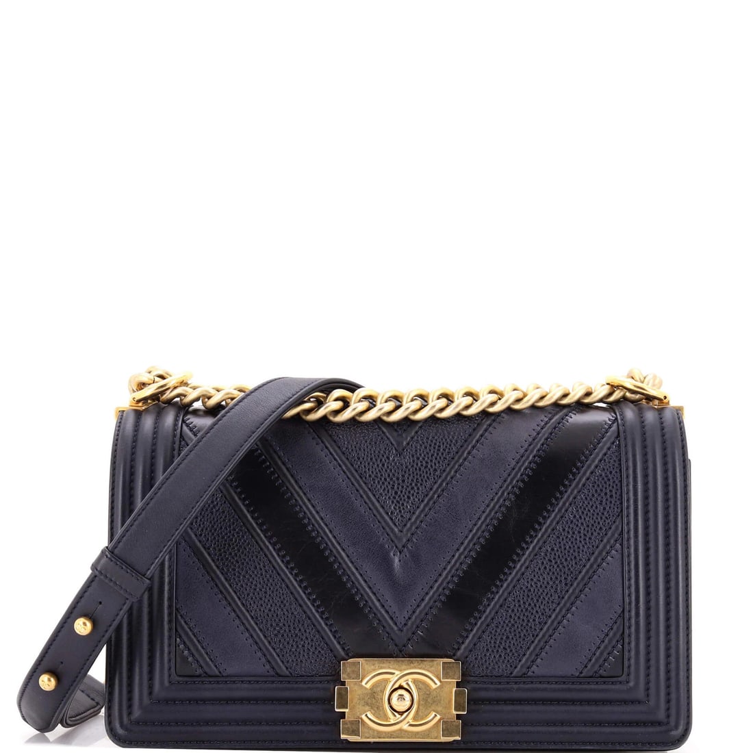 Medium Chanel Boy Flap Bag Chevron Caviar and Calfskin Old: Medium Chanel Boy Flap Bag Chevron Caviar and Calfskin Old A timeless piece of luxury, this vintage Chanel Boy Flap Bag boasts a stunning blue exterior adorned with chevron patterns and caviar detaili