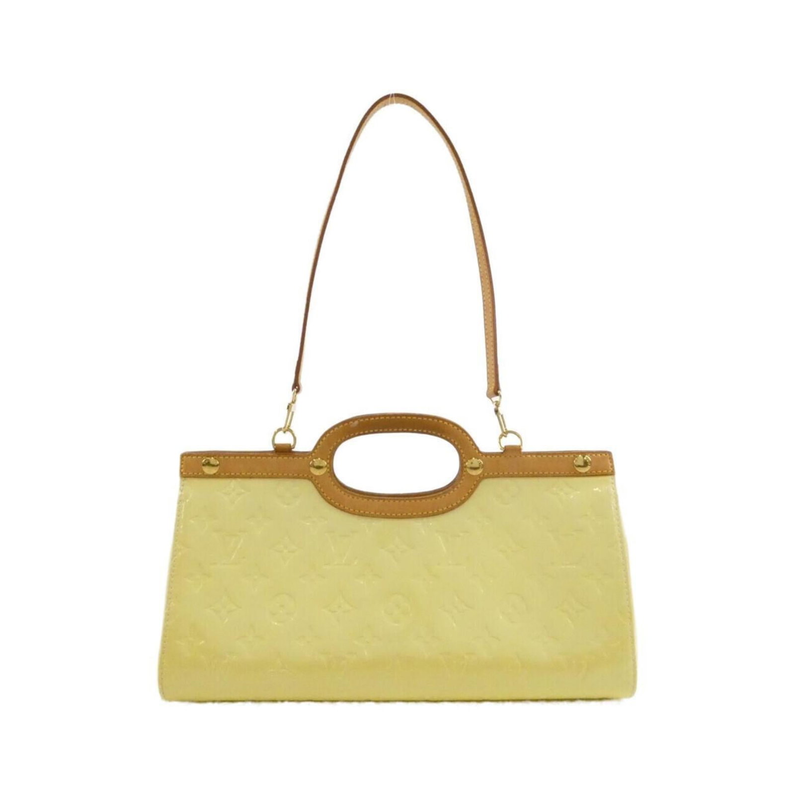 Louis Vuitton Vernis Handbag: Louis Vuitton Vernis Handbag A stunning Louis Vuitton Vernis handbag in pristine white, boasting the iconic monogram pattern and signature boxy shape. With its durable Vernis leather exterior and spac