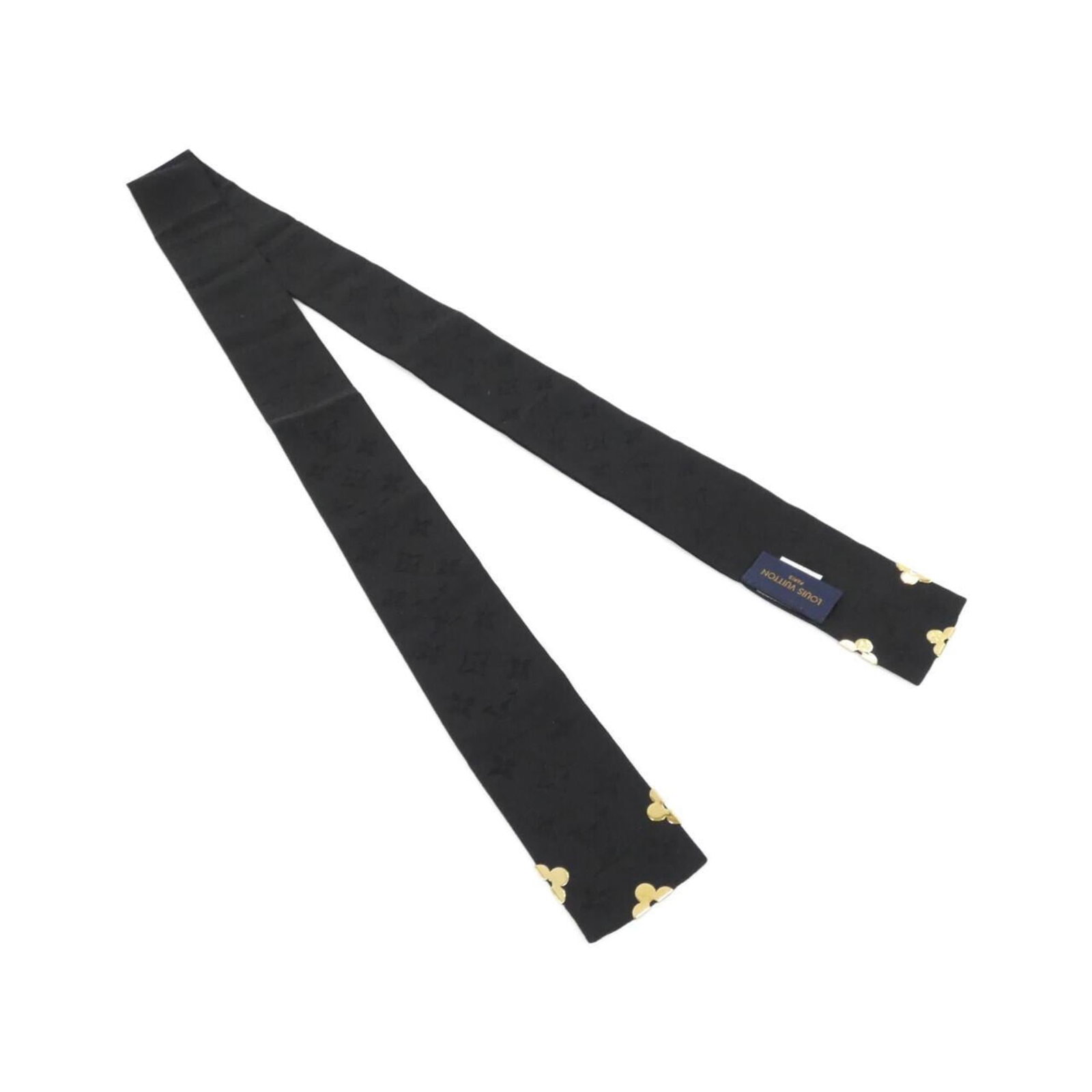 Louis Vuitton Silk Scarf: Louis Vuitton Silk Scarf Elevate your style with this pre-owned Louis Vuitton silk scarf, boasting the iconic brand's signature monogram pattern in sleek black. Made from luxurious silk, its subtle sh