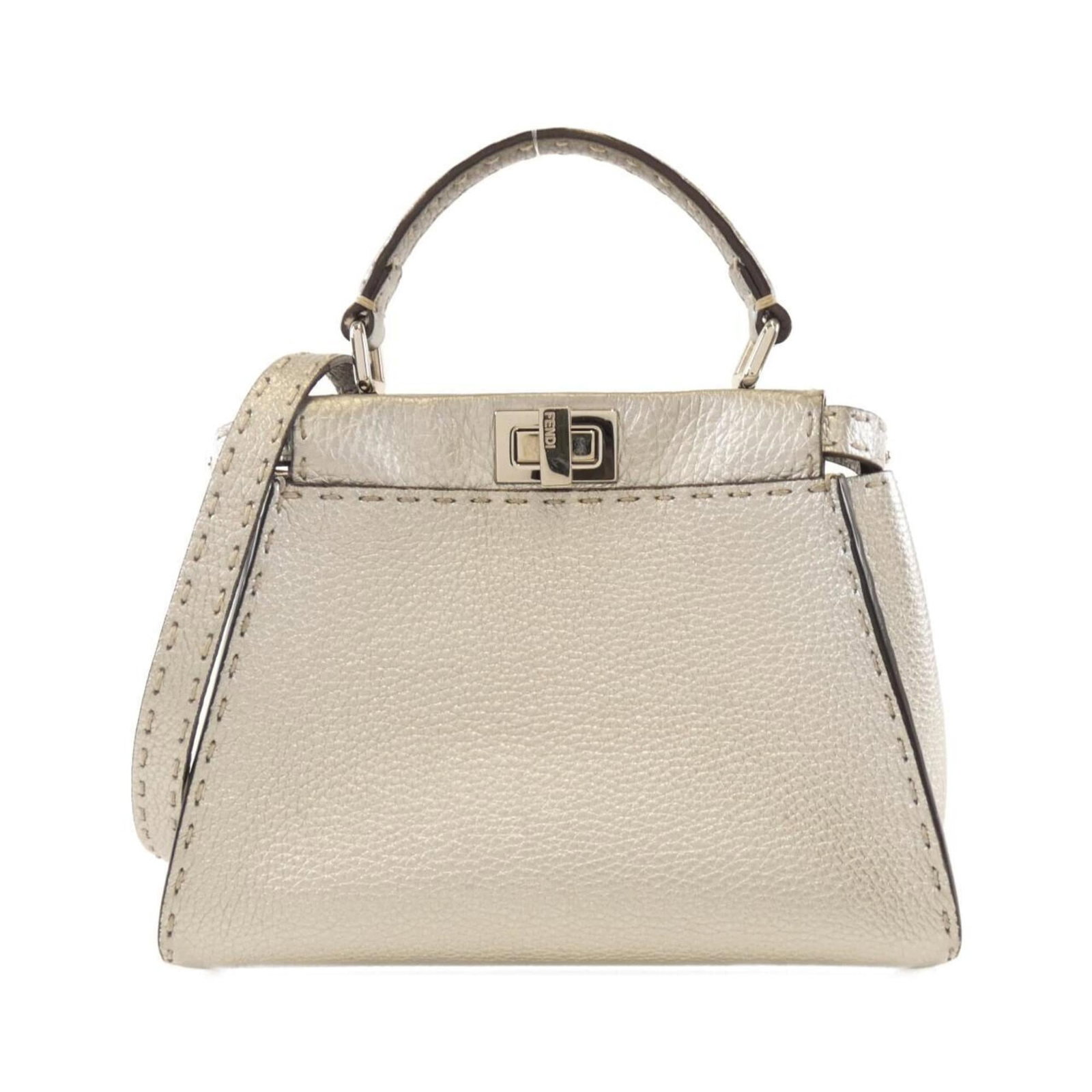 Leather Fendi Handbag: Leather Fendi Handbag Experience the timeless elegance of Fendi with this stunning leather handbag, crafted from rich calfskin and adorned with sleek silver hardware. Its classic design and versatile