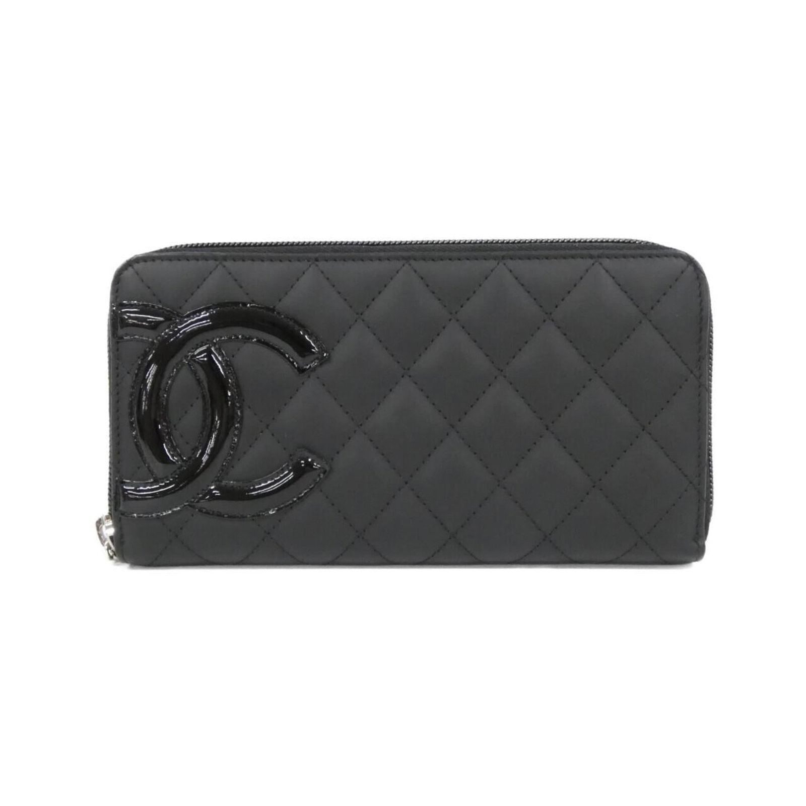 Chanel Bi-Fold Leather Wallet: Chanel Bi-Fold Leather Wallet A timeless piece of luxury, this Chanel bi-fold leather wallet exudes sophistication with its sleek black calfskin design and classic bi-fold closure. With its compact si