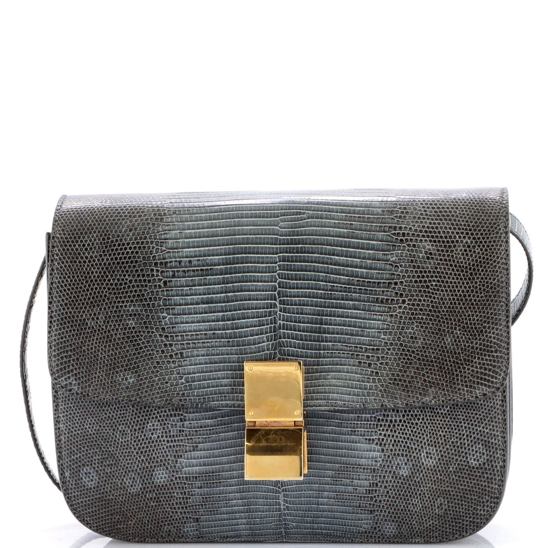 Celine Classic Medium Box Bag in Lizard: Celine Classic Medium Box Bag in Lizard Experience the timeless elegance of the Celine Classic Medium Box Bag in Lizard, boasting a sophisticated gray exterior and rich leather interior. This iconic s