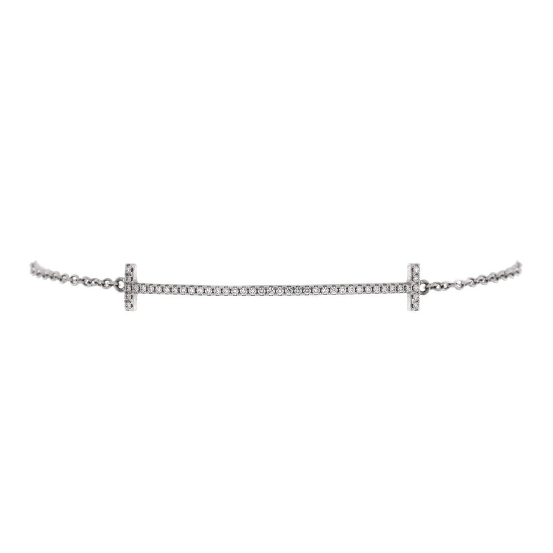 Medium Tiffany & Co. T Smile Chain Bracelet 18K White Gold with Diamonds: Medium Tiffany & Co. T Smile Chain Bracelet 18K White Gold with Diamonds A stunning medium Tiffany & Co. T Smile Chain Bracelet in 18K white gold is up for grabs, boasting an impressive array of