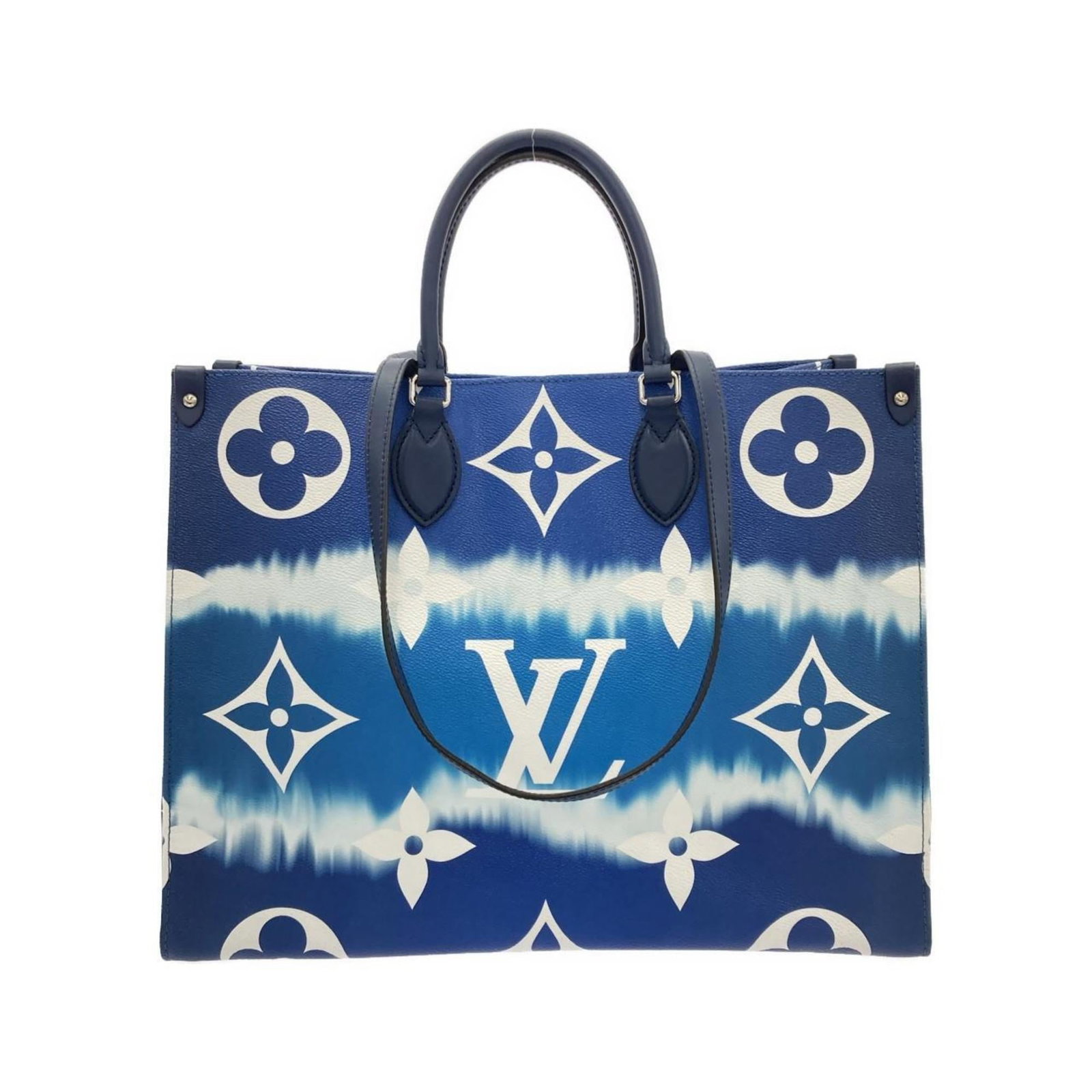 Louis Vuitton Coated Canvas Handbag: Louis Vuitton Coated Canvas Handbag A stunning Louis Vuitton handbag in rich blue coated canvas, adorned with sleek silver hardware, perfect for adding a touch of luxury to any outfit. With its classi
