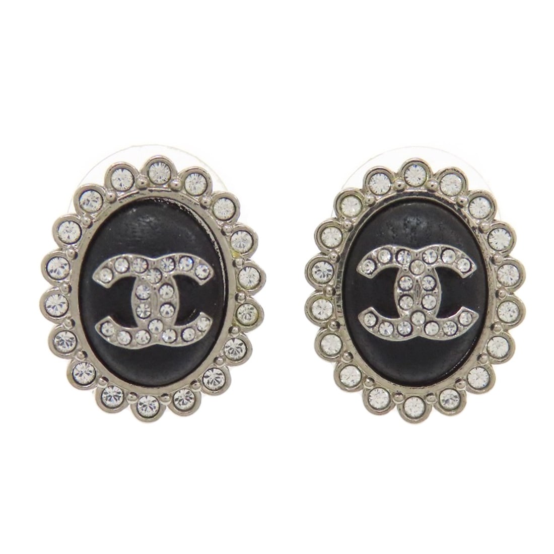 Metal CHANEL COCO Mark rhinestone earring: Metal CHANEL COCO Mark rhinestone earring Add a touch of timeless elegance to your outfit with these stunning silver metal CHANEL COCO Mark rhinestone earrings, crafted in the iconic French fashion