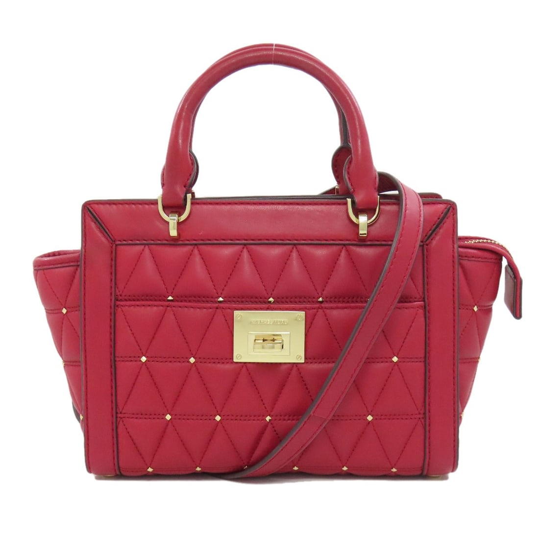 Leather MICHAEL KORS 2WAY Handbag: Leather MICHAEL KORS 2WAY Handbag Make a statement with this stunning Michael Kors 2-way handbag, crafted from rich red leather that adds a pop of color to any outfit. The sleek design and versatile 2