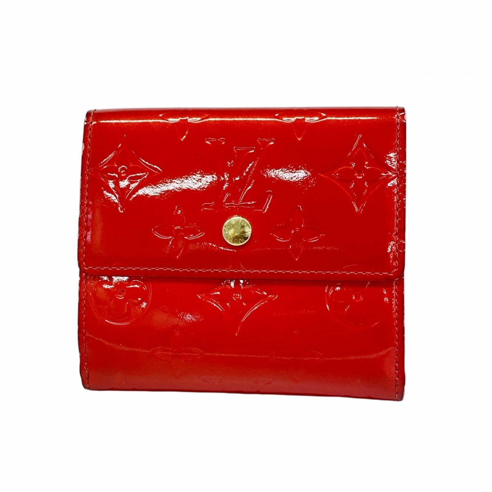 Louis Vuitton Tri-Fold Wallet: Louis Vuitton Tri-Fold Wallet A rare find for the fashion enthusiast, this Louis Vuitton tri-fold wallet boasts a timeless design with its iconic monogram pattern and classic red colorway. With its st