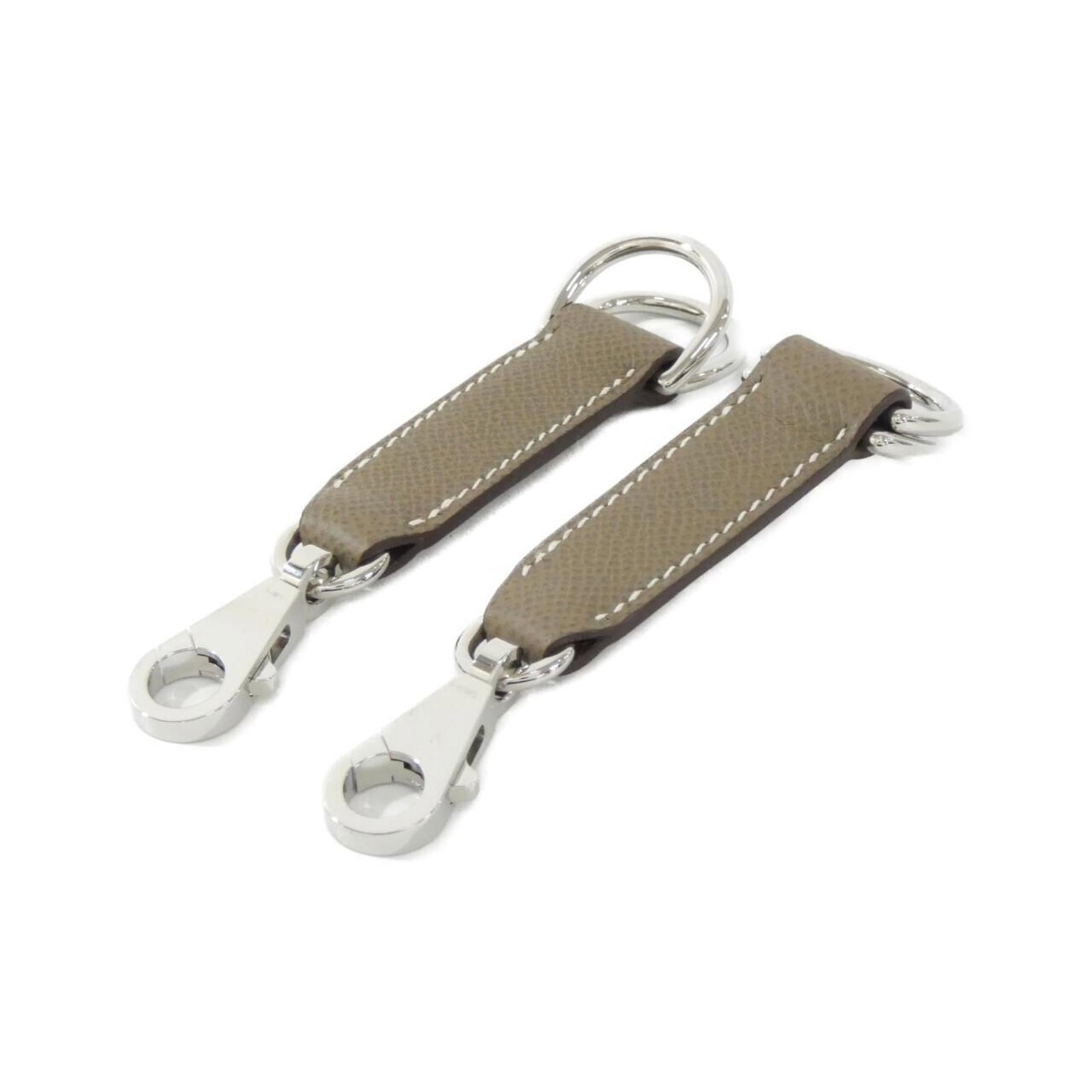 Epsom Leather Hermes Strap: Epsom Leather Hermes Strap A rare find for the discerning watch collector, this Epsom Leather Hermes Strap boasts rich, luxurious feel and subtle Etoupe Gray hue reminiscent of classic French elegance