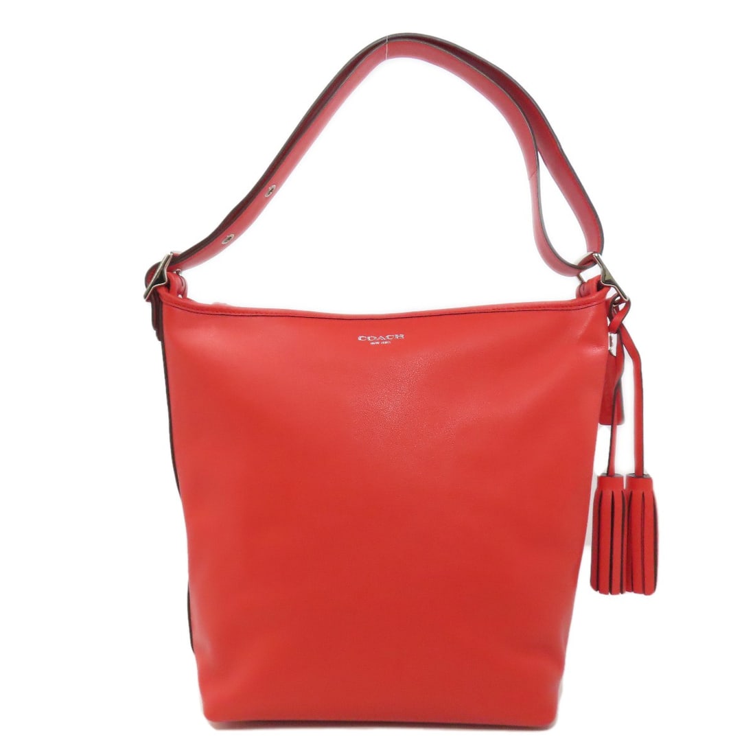 Coach 19889 Legacy Shoulder Bag in Leather: Coach 19889 Legacy Shoulder Bag in Leather The Coach 19889 Legacy Shoulder Bag is a vibrant and stylish accessory that adds a pop of orange to any outfit. Made from high-quality leather, this shoulder