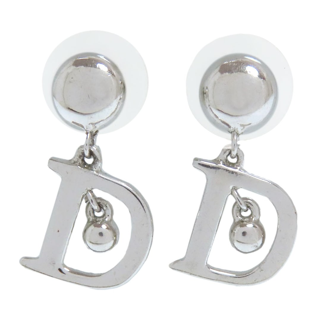 Metal CHRISTIAN DIOR D logo earring: Metal CHRISTIAN DIOR D logo earring Elevate your style with the iconic CHRISTIAN DIOR D logo earring, crafted from sleek silver metal that adds a touch of luxury to any outfit. This sophisticated earr