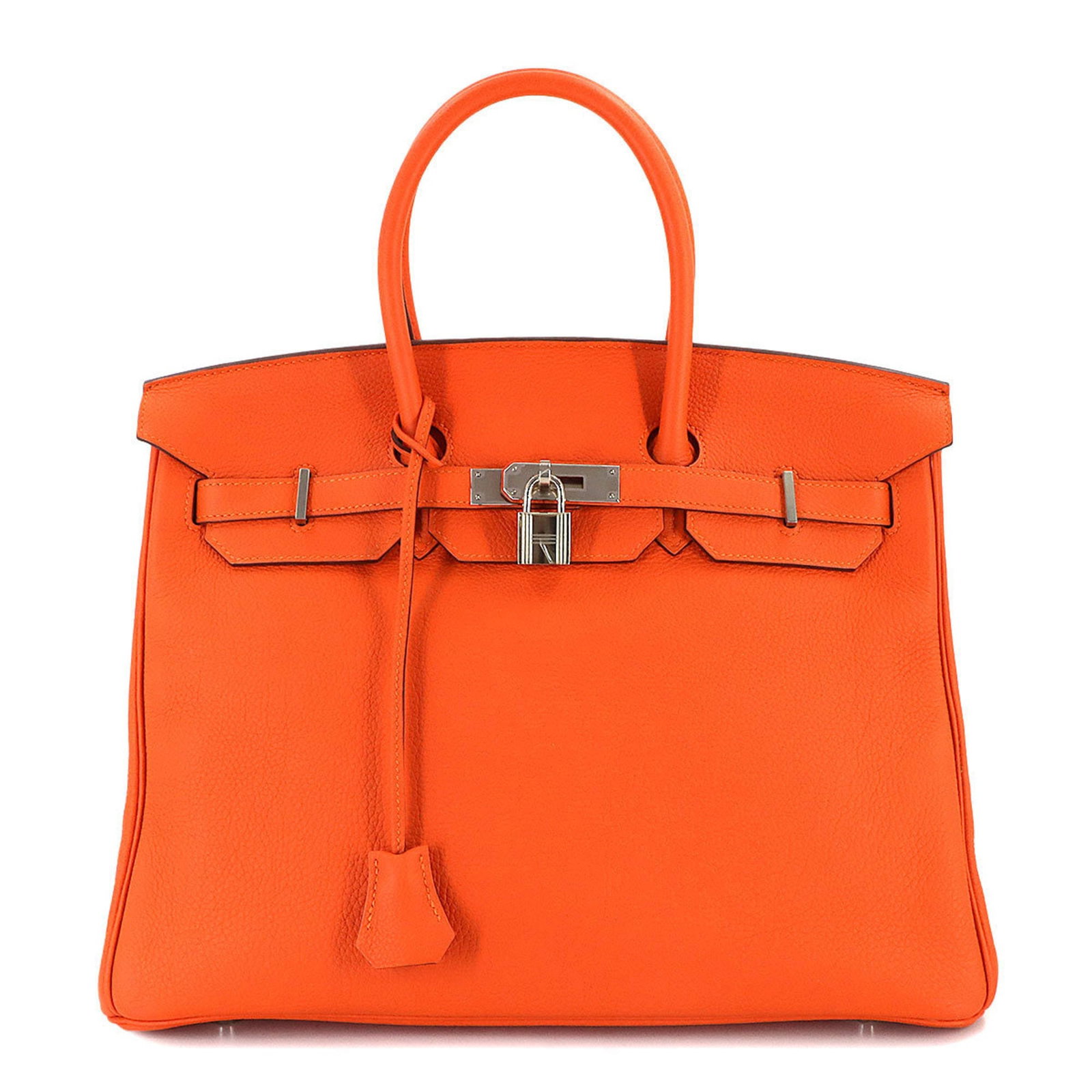 Leather Hermes Handbag Togo: Leather Hermes Handbag Togo A stunning Togo leather handbag from the iconic French fashion house Hermes, boasting vibrant Feu and Orange hues that add a pop of color to any outfit. With its classic de