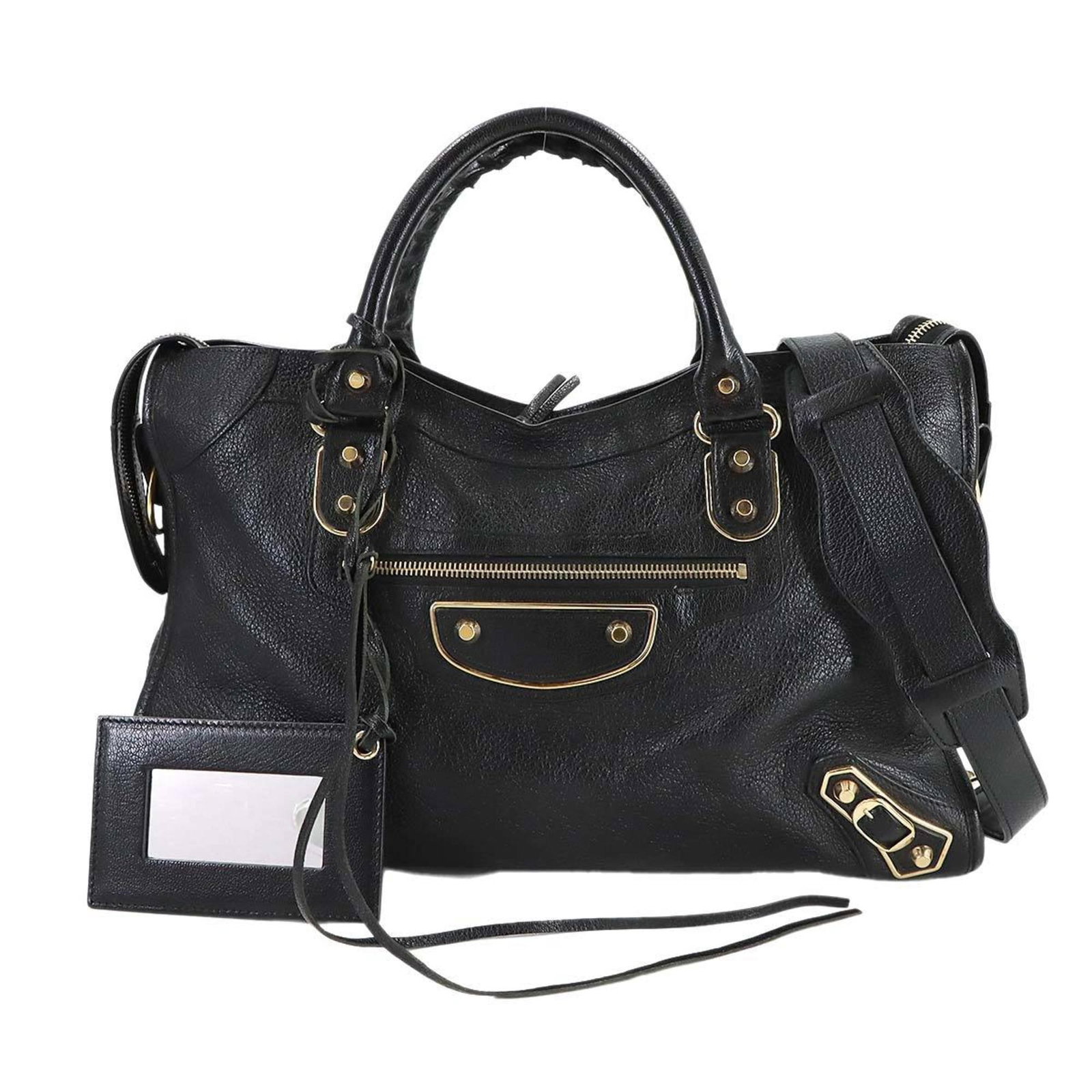 Balenciaga Leather Handbag: Balenciaga Leather Handbag Experience the epitome of luxury with this stunning Balenciaga leather handbag, boasting sleek black leather and a timeless design that exudes sophistication. Measuring