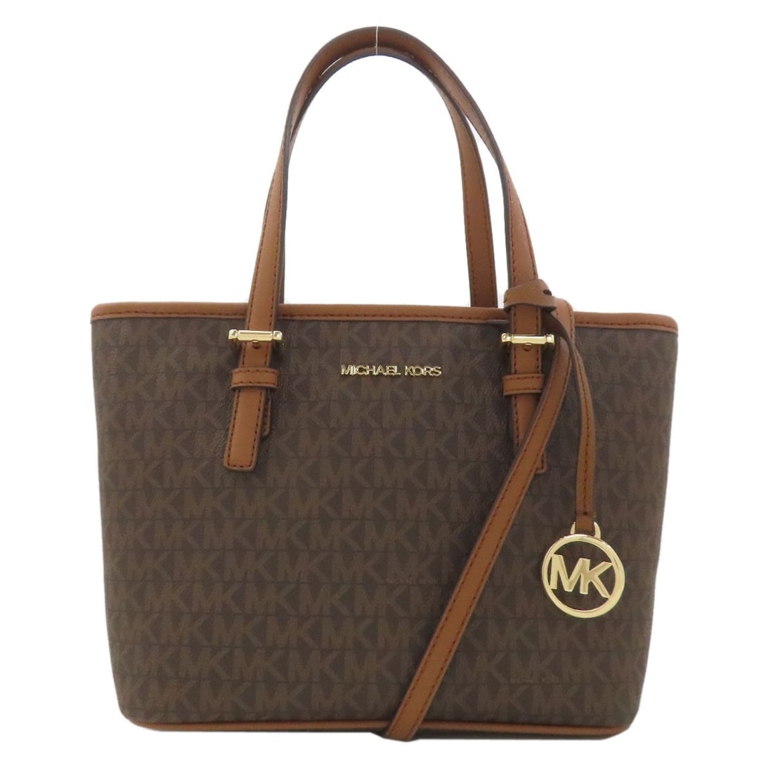 PVC Michael Kors MK Signature 2WAY Handbag: PVC Michael Kors MK Signature 2WAY Handbag Elevate your style with the iconic Michael Kors MK Signature 2WAY handbag, crafted from durable PVC that adds a touch of edgy sophistication to any outfit. T