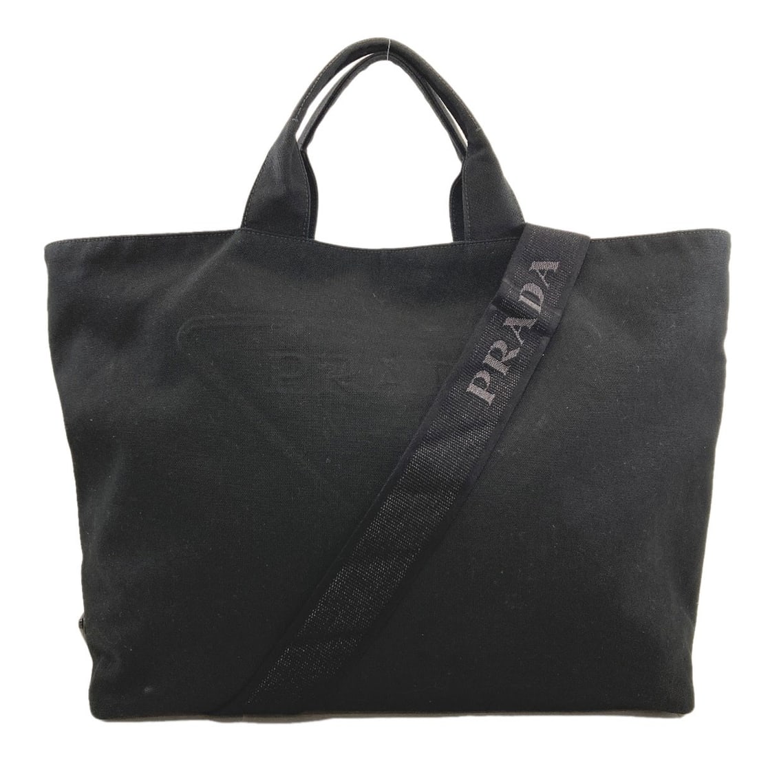 Canvas PRADA Drill 2WAY Tote Bag: Canvas PRADA Drill 2WAY Tote Bag A timeless classic, the Canvas PRADA Drill 2WAY Tote Bag is a masterclass in understated elegance, with its sleek black canvas exterior and versatile design that makes
