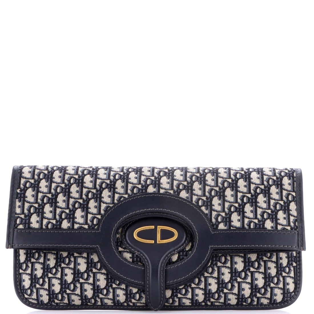 Christian Dior Fold Over Clutch in Oblique Canvas: Christian Dior Fold Over Clutch in Oblique Canvas Elevate your evening look with the iconic Christian Dior Fold Over Clutch in Oblique Canvas. This stunning blue clutch boasts a timeless fold-over