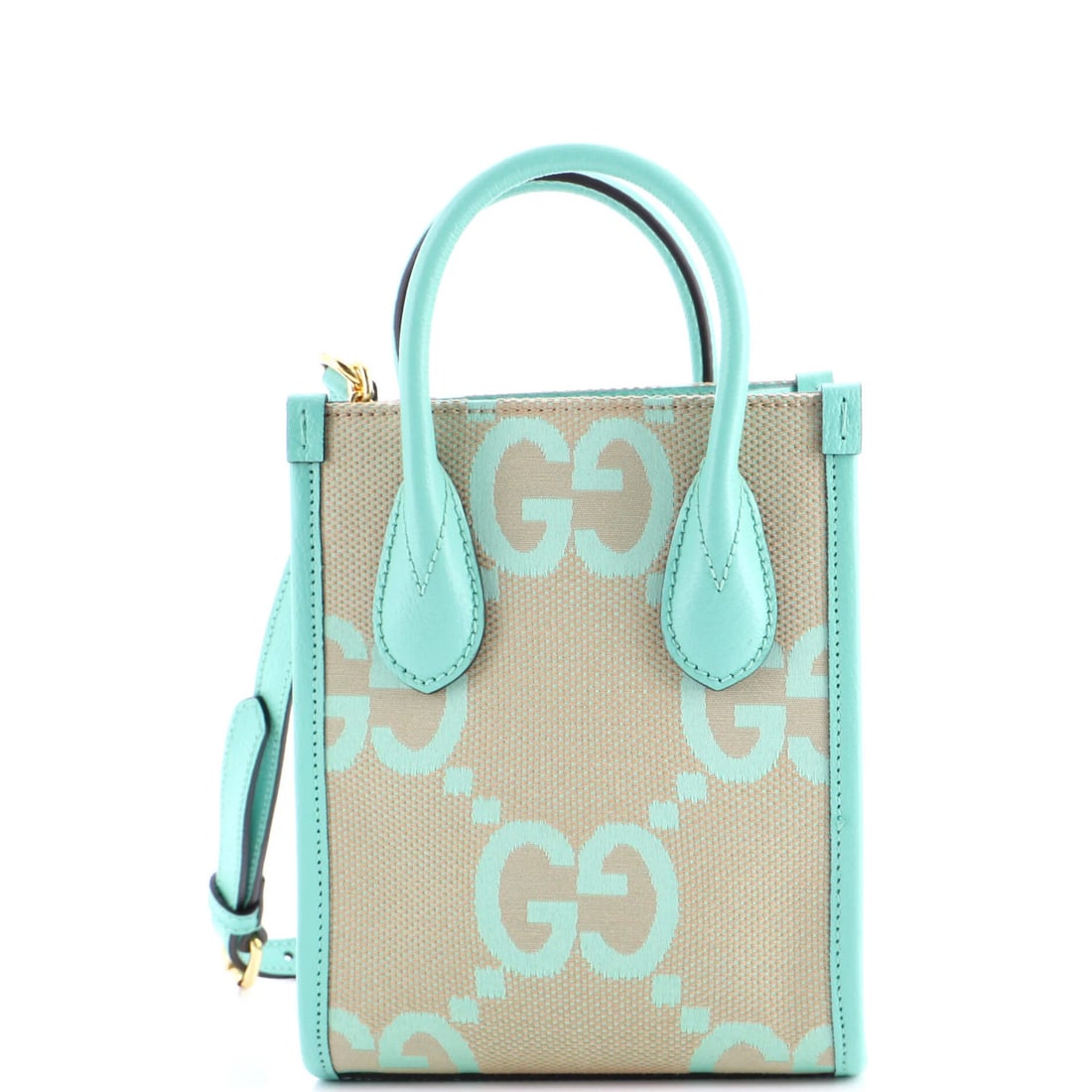 Gucci Jumbo GG Canvas Mini Tote: Gucci Jumbo GG Canvas Mini Tote Elevate your everyday with the iconic Gucci Jumbo GG Canvas Mini Tote, boasting a vibrant green exterior and classic leather accents. This stylish cross-body bag is per