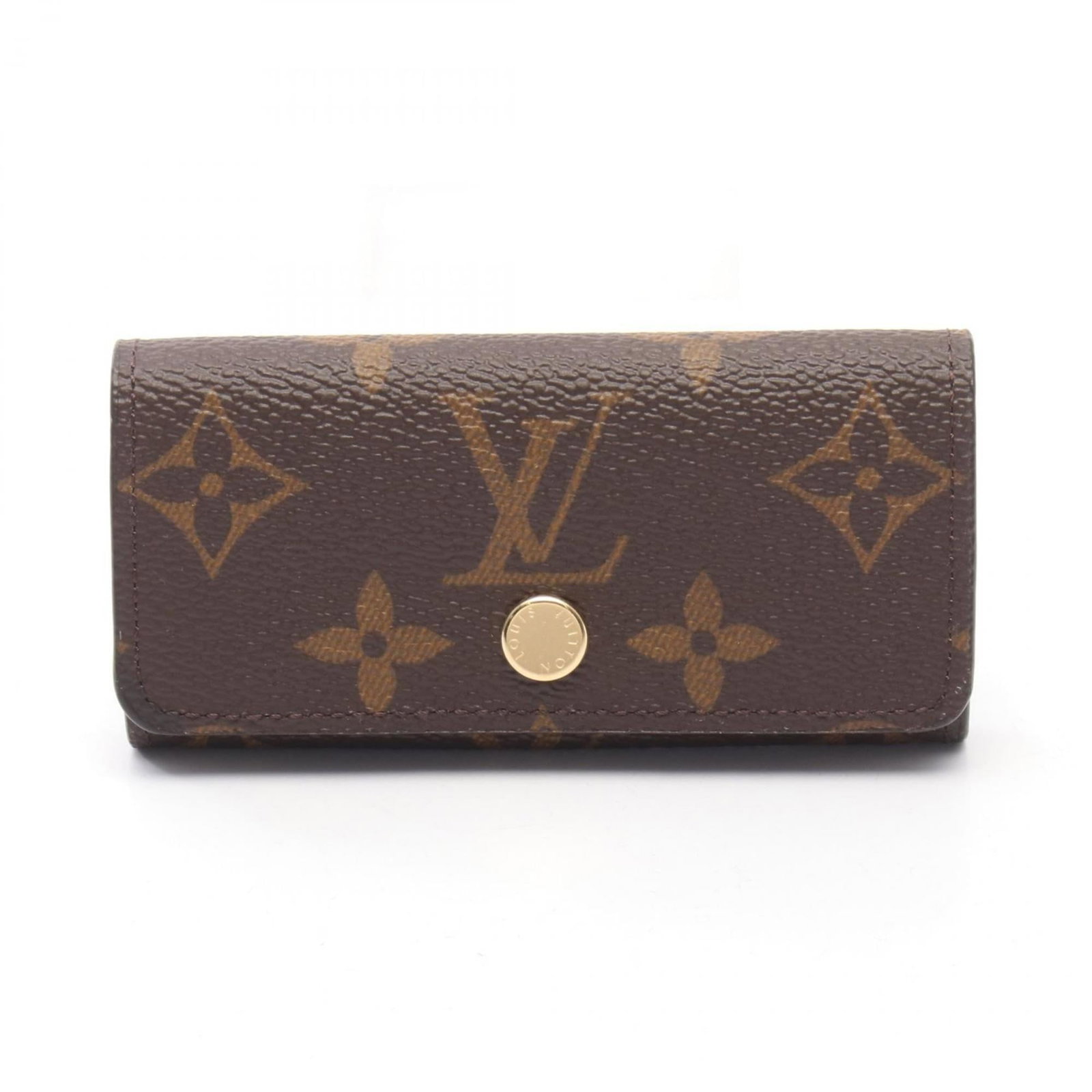 Louis Vuitton Monogram Keycase: Louis Vuitton Monogram Keycase A timeless accessory for the modern woman, this Louis Vuitton Monogram Keycase boasts the iconic brand's signature brown monogram pattern and sleek design. With its clas