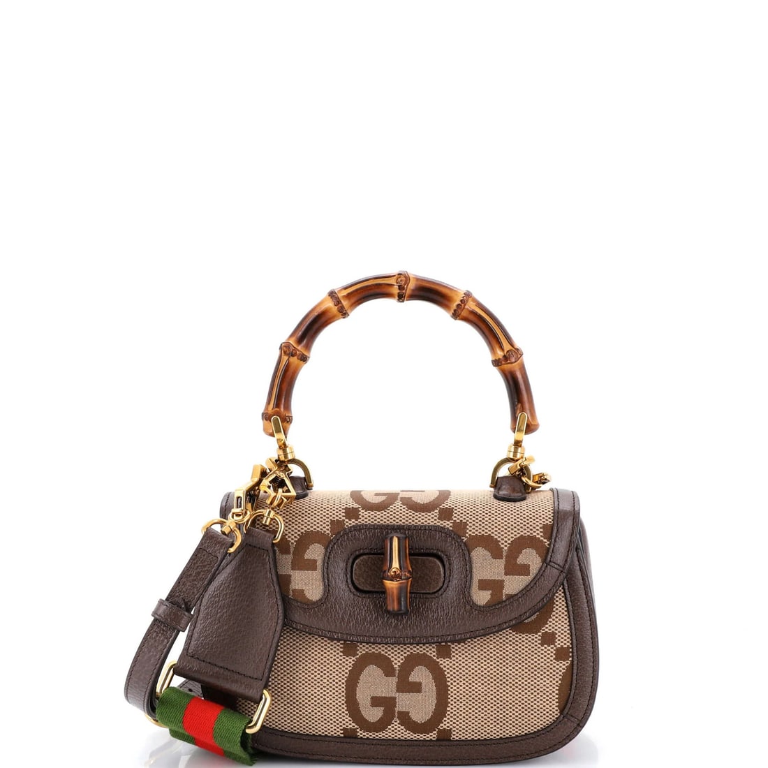 Gucci Bamboo 1947 Top Handle Bag in Small GG Canvas: Gucci Bamboo 1947 Top Handle Bag in Small GG Canvas The Gucci Bamboo 1947 Top Handle Bag is a timeless classic, boasting the iconic Jumbo GG Canvas design and sturdy top handle that makes it easy to c