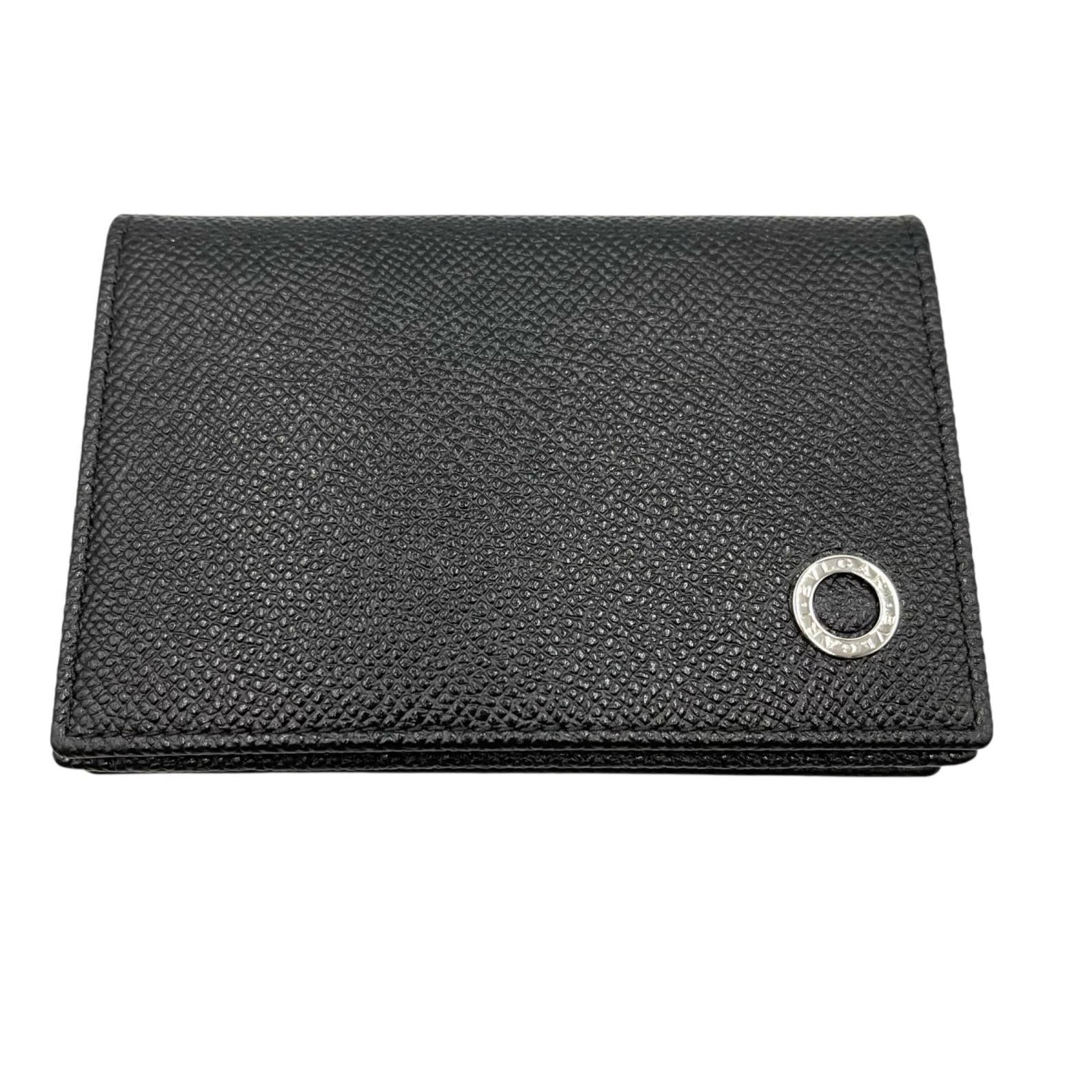 Leather Bvlgari Card Case: Leather Bvlgari Card Case A sleek and sophisticated accessory for the modern gentleman, this pre-owned Bvlgari leather card case boasts classic Italian style with its high-quality black leather exteri