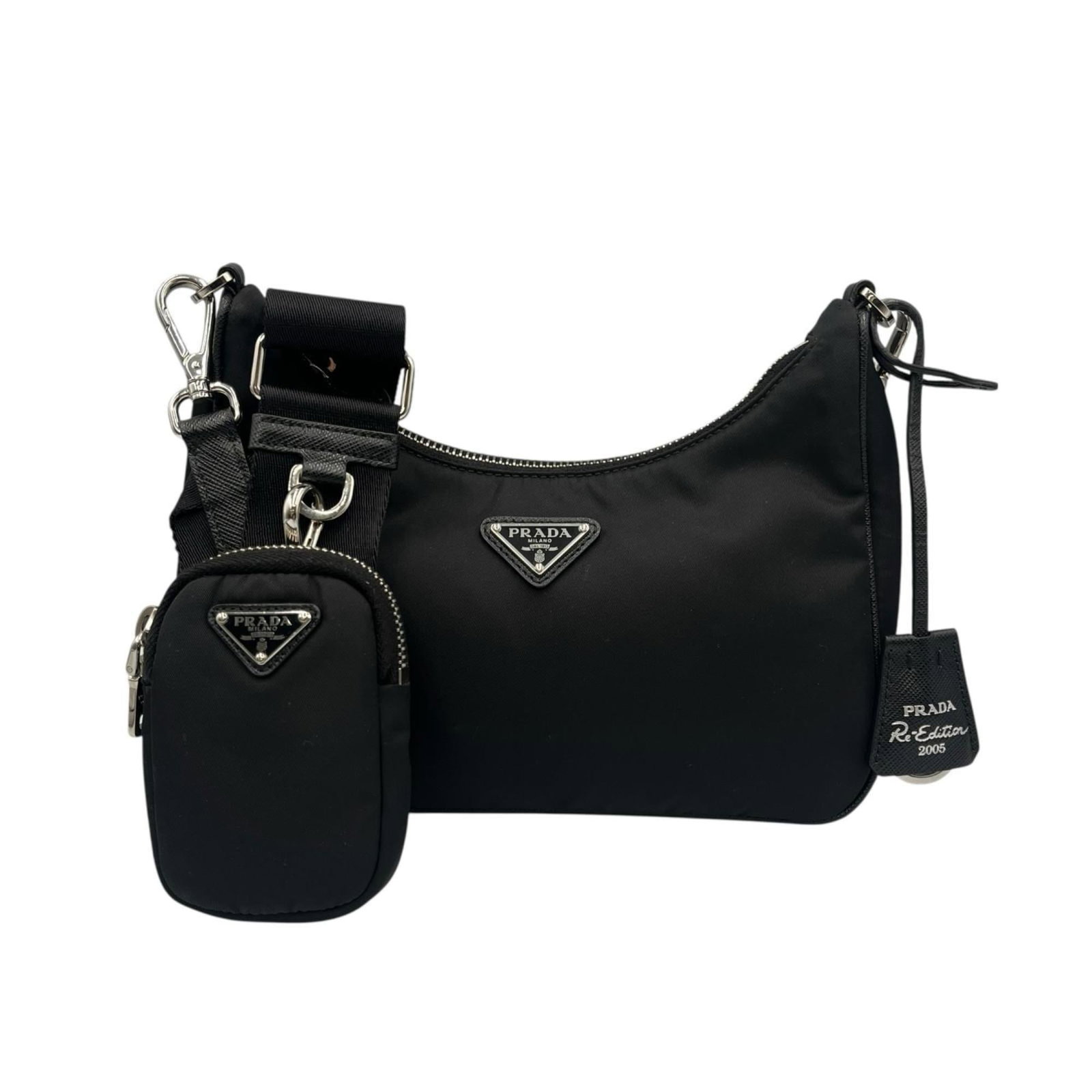 Prada Nylon Pouch Shoulder Bag: Prada Nylon Pouch Shoulder Bag A sleek and versatile Prada Nylon Pouch Shoulder Bag, perfect for everyday use, boasts a durable nylon construction and timeless design that exudes sophistication. With