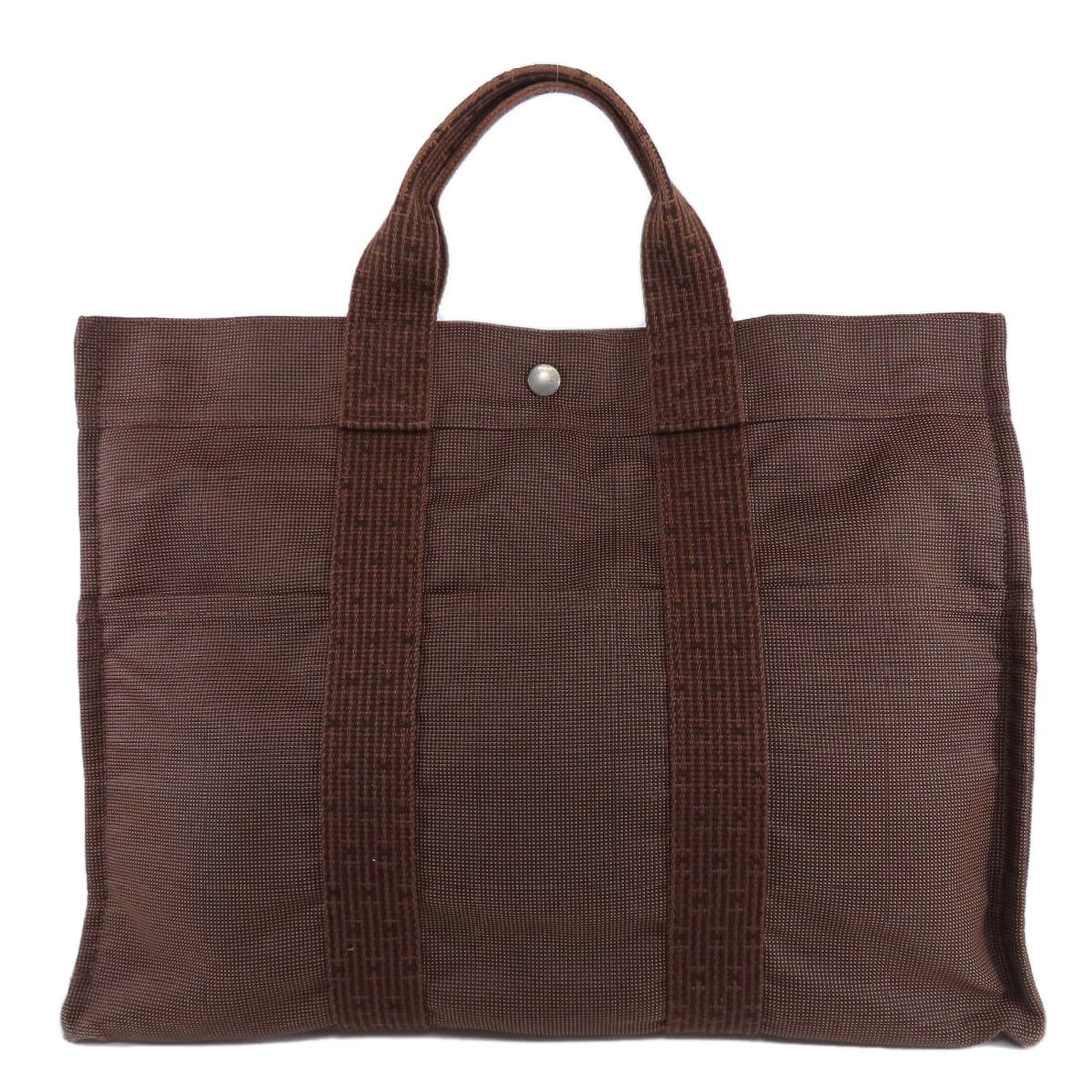 Canvas HERMES Her LineMM Tote Bag: Canvas HERMES Her LineMM Tote Bag Experience the timeless elegance of Herm?s with this classic Brown Canvas Tote Bag, crafted from high-quality materials and originating from France. The iconic design