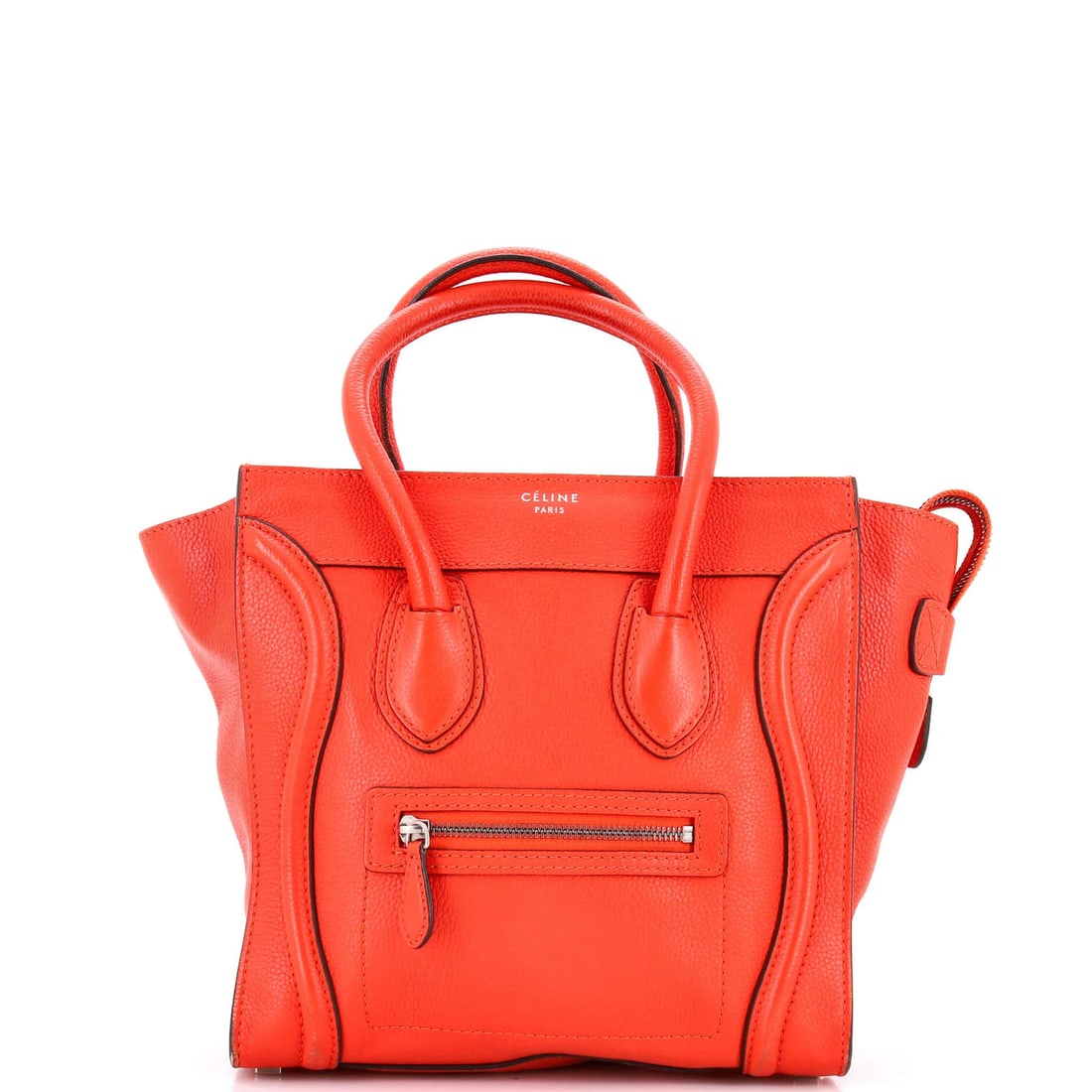 Celine Luggage Bag in Grainy Leather: Celine Luggage Bag in Grainy Leather For sale is a stunning Celine luggage bag in grainy leather, boasting a bold red exterior that adds a pop of color to any outfit. With its classic micro design and