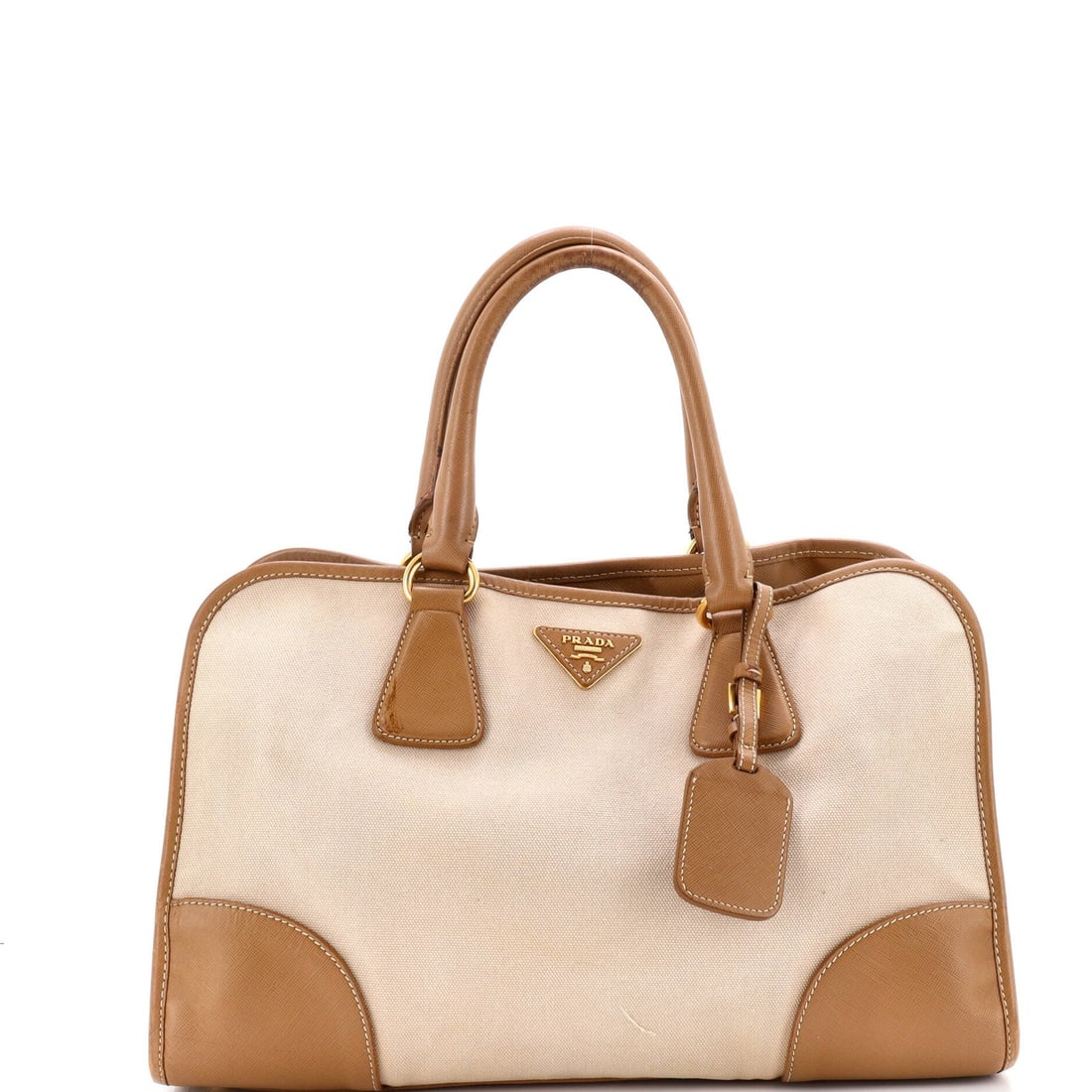 Prada Large Convertible Tote with Canvas and Saffiano Leather: Prada Large Convertible Tote with Canvas and Saffiano Leather A timeless and versatile Prada Large Convertible Tote, crafted from rich Saffiano leather and canvas, boasts a spacious interior with gold