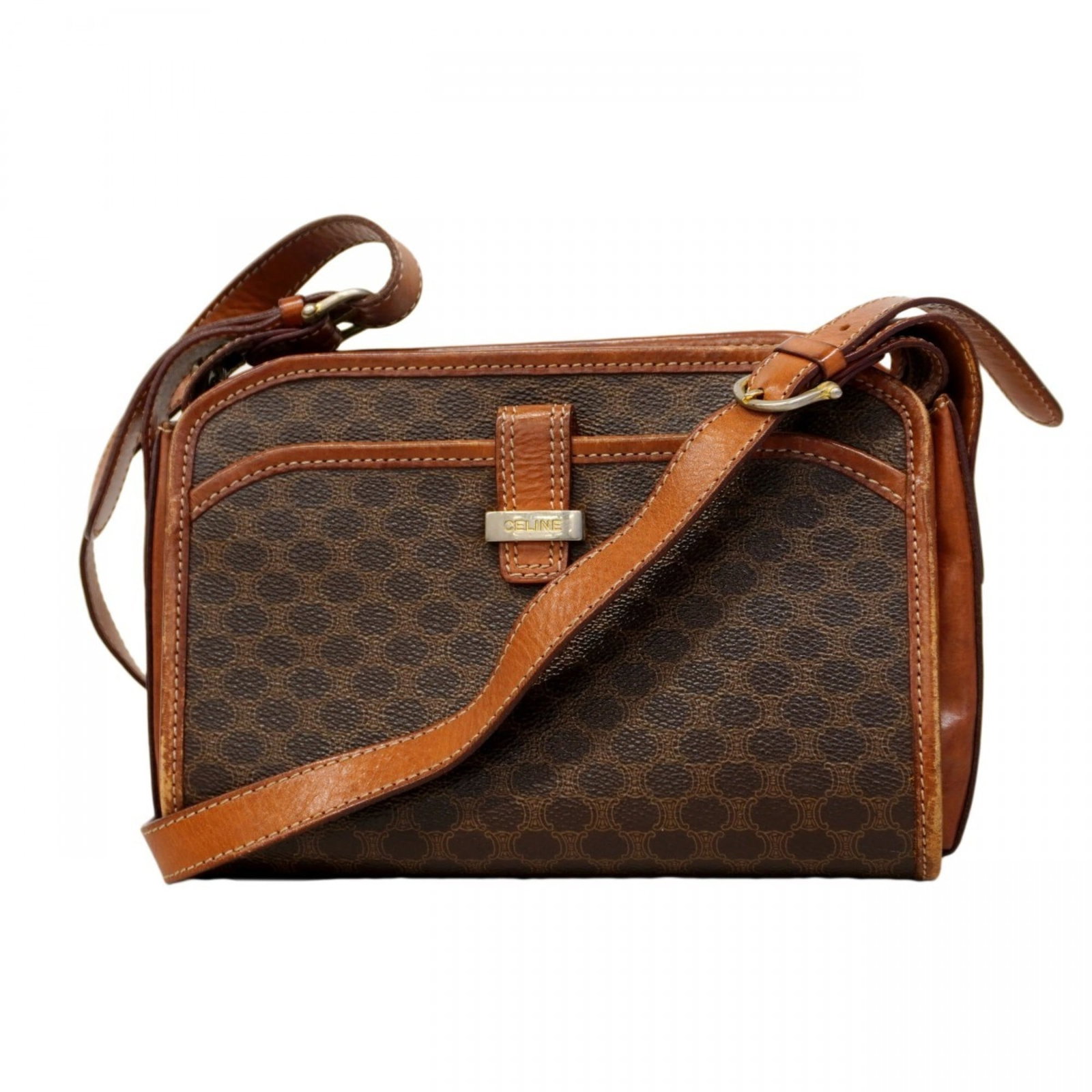 Celine PVC Shoulder Bag: Celine PVC Shoulder Bag A timeless Celine shoulder bag in rich brown Pvc, adorned with elegant gold hardware, is now available for the discerning buyer. With its classic design and durable constructio