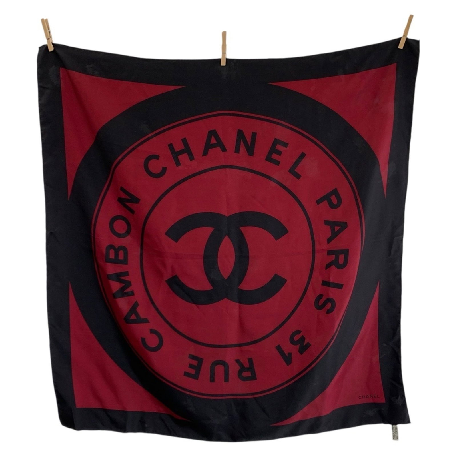 Chanel Silk Scarf: Chanel Silk Scarf A timeless piece of luxury, this vintage Chanel silk scarf boasts the iconic interlocking CC logo and is crafted from high-quality silk. With its classic black and red color palette,