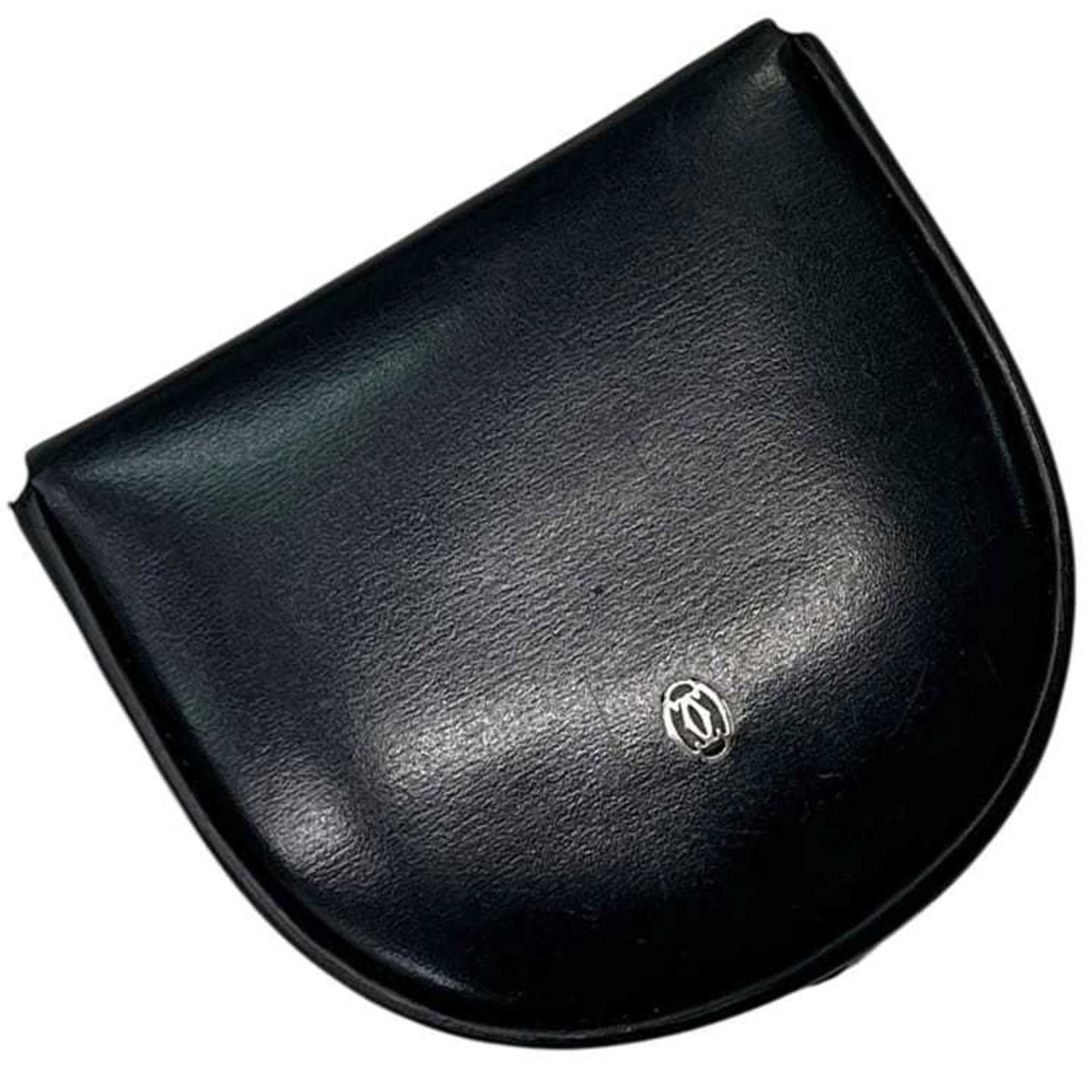 Cartier Coin Purse/ Case Leather: Cartier Coin Purse/ Case Leather A sleek and sophisticated accessory for the modern woman, this Cartier coin purse is crafted from rich black leather and exudes timeless elegance. With its compact siz
